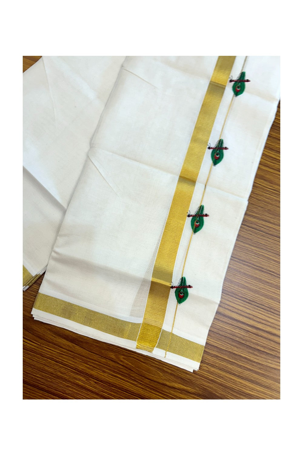 22% Discount!! KaithariKada Balaramapuram 100% Cotton DOUBLE OFF WHITE - (Ubleached) Mundu/Dhoti - 80x90 - 1 inch Gold Kasavu with Green Peacock Feather & Flute Printed Design Kara - 31KK5219 GAN
