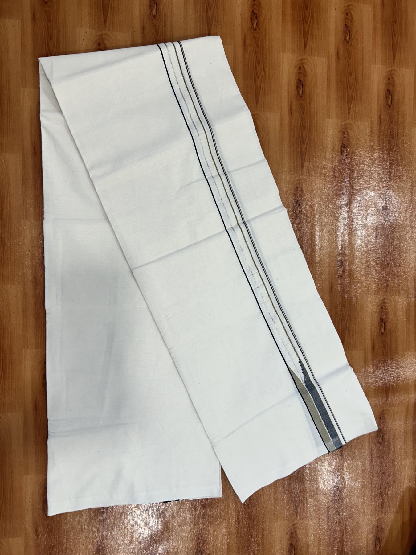 Single Mundu/Dhoti - Off White (Unbleached) 20% Discount !! KaithariKada Balaramapuram 100% Cotton Twisted 100s Thread - 0.75 inch Silver Kasav Black & Mustard Yellow Puliyilakkara Chutty (2 meter/4 Muzham) - 7 KK5407 ASH