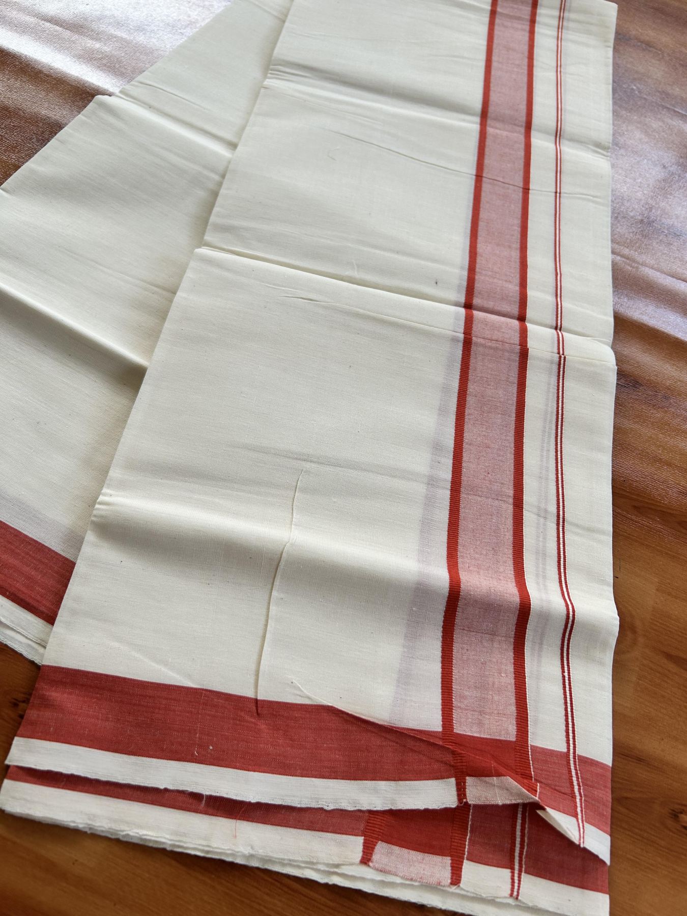 Single Off White - (Unbleached) Mundu/Dhoti - KaithariKada Balaramapuram Pure Cotton 70x30 - 1.25 inch Reddish Orange Shaded Kara (2 meter / 4 muzham) - 2 KK5409 PMC