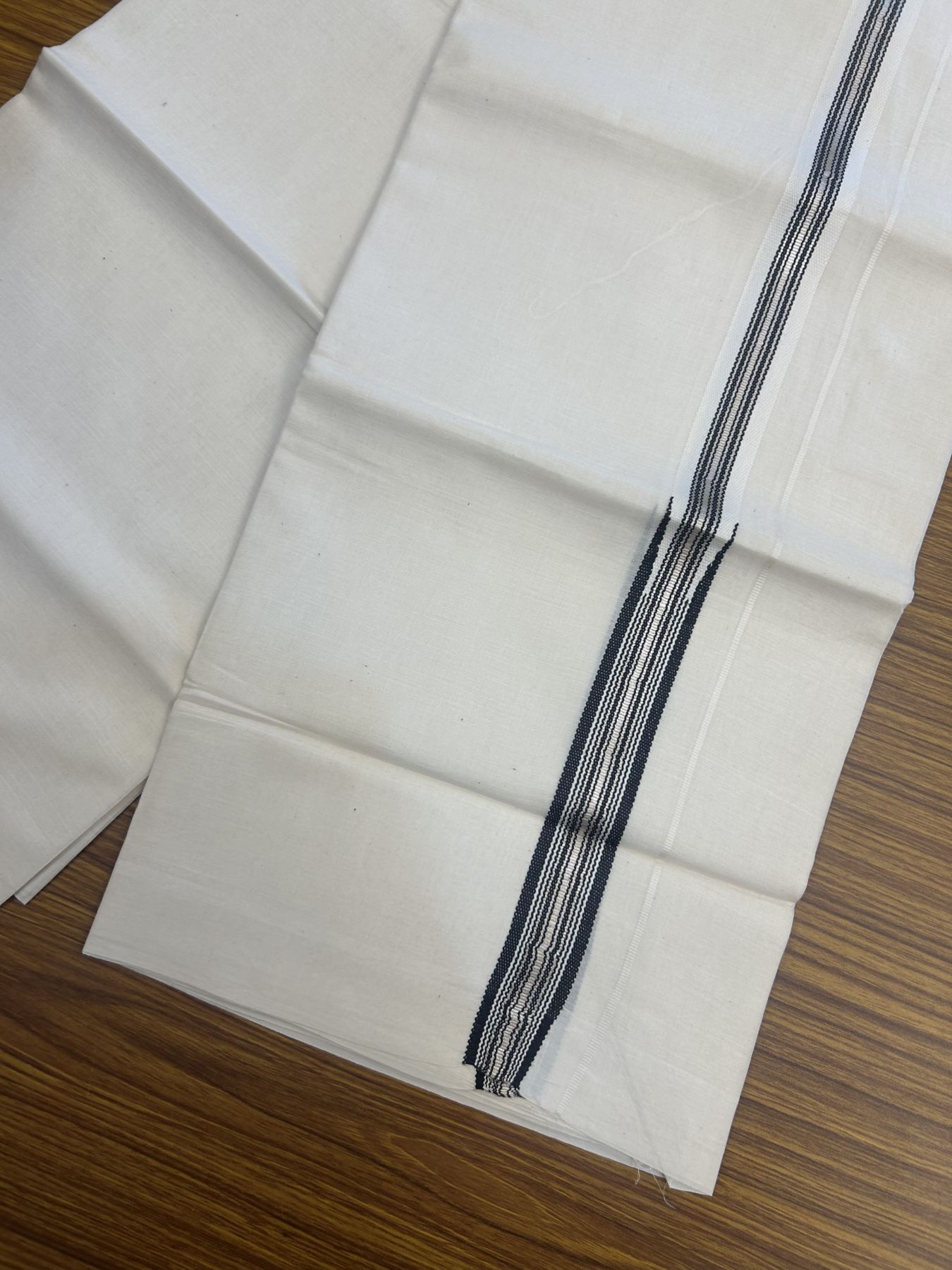 20% Discount!! KaithariKada Balaramapuram Pure Cotton Double Off White - (Unbleached) - Mundu/Dhoti - 100x80 - 1 inch Puliyilakkara Silver Kasav & Black Stripes One Side Chutty Kara 4 mtr (8.5 muzham) - 34 KK5311 VAS