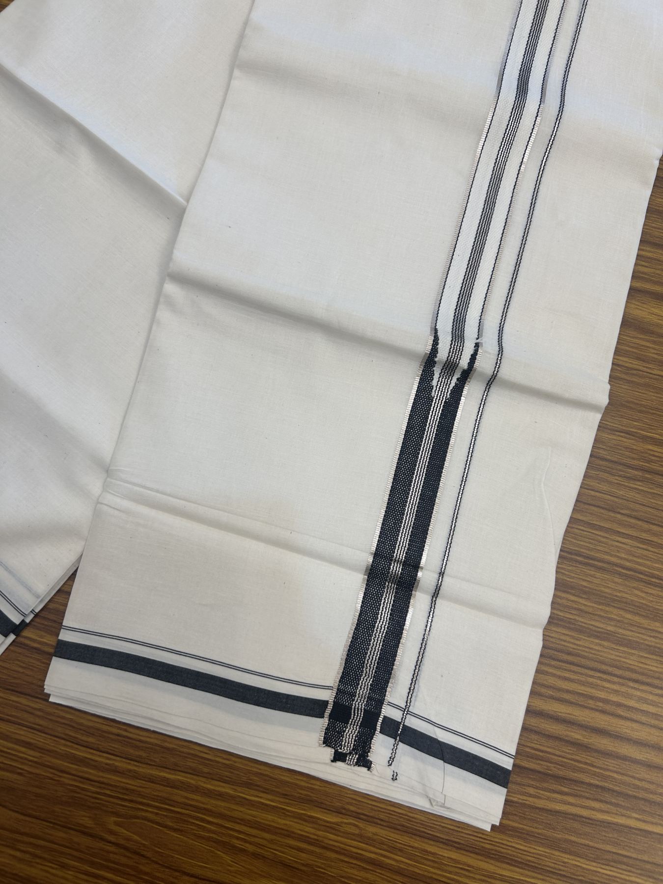 20% Discount!! KaithariKada Balaramapuram Pure Cotton Double Off White - (Unbleached) - Mundu/Dhoti - 100x80 - 1 inch Puliyilakkara Silver Kasav & Black Stripes One Side Chutty Kara 4 mtr (8.5 muzham) - 38 KK5311 VAS