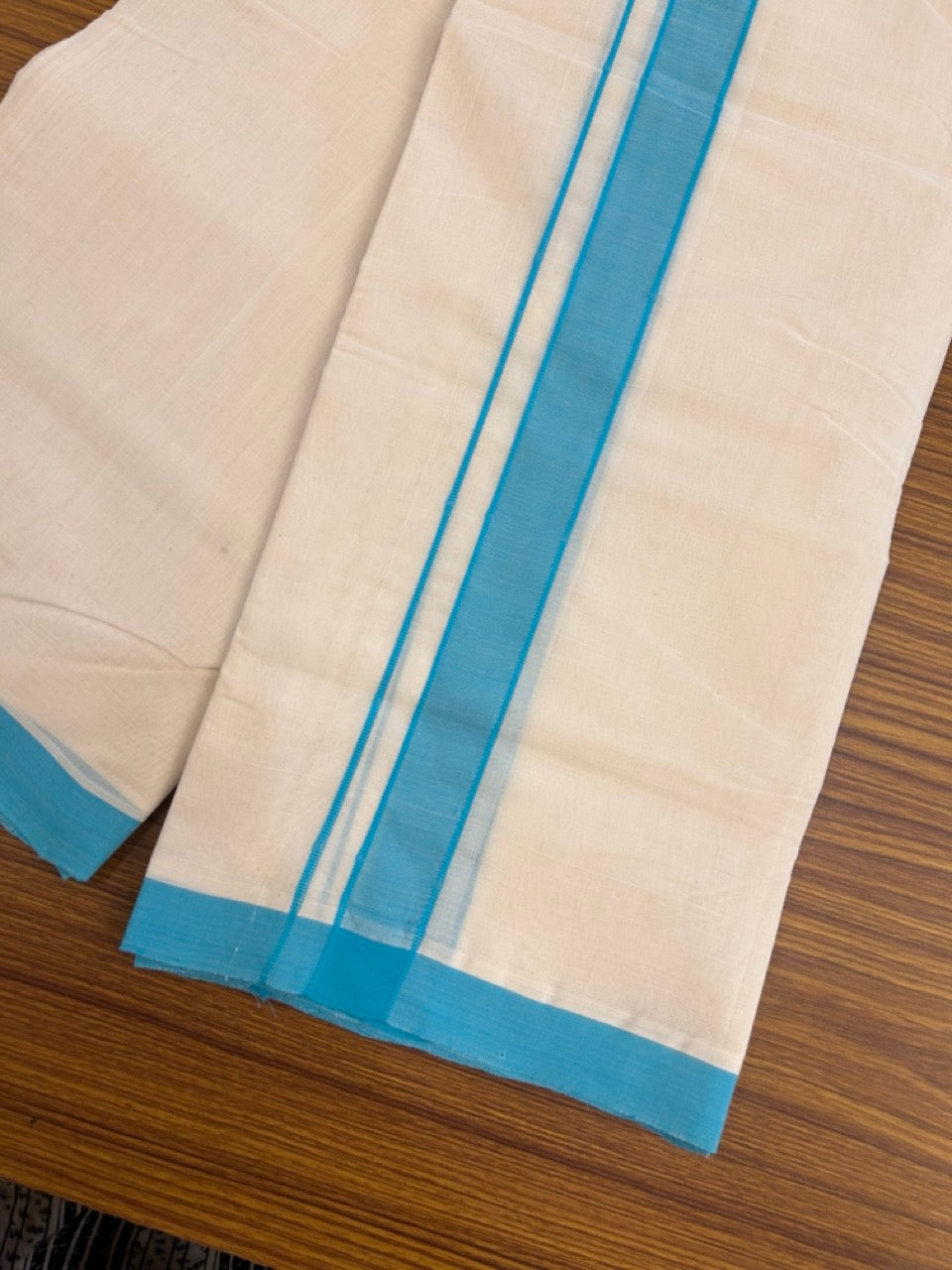 25% Discount! KaithariKada Handloom Millpaav Balaramapuram - Cotton Double Mundu/Dhoti Off white (Unbleached) - 80x90 - 1.25 inch Sky Blue Mulloth Kara 3.60 meter (8 Muzham) - 35 KK5256 RAM