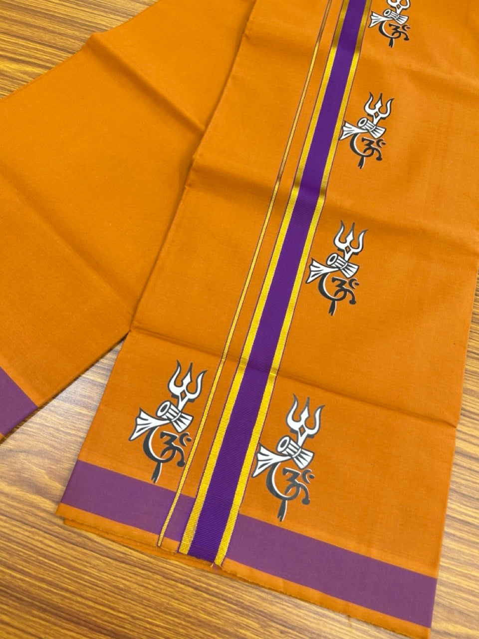 33% Discount !! Kaitharikada - Pure Cotton - Single Kaily / Lungi - (40s) - 1.25 inch Gold Kasav & Purple Printed Trishul Design kara with Dark Kavi colour body (2 meter / 4 muzham) - 1 KK8028 GAN