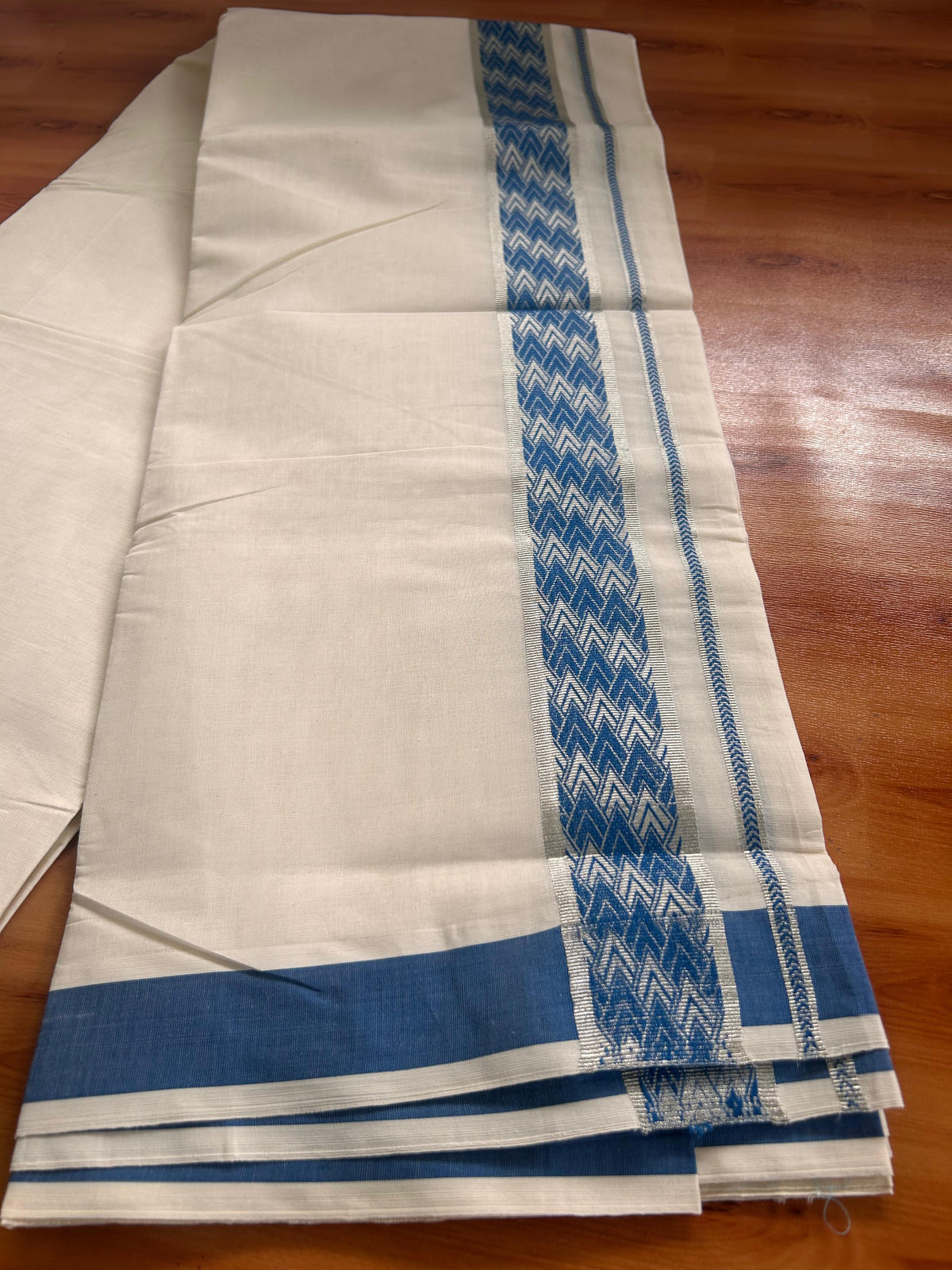 Double Off White (Unbleached) Mundu/Dhoti - 20% Discount! Kaitharikada Pure Cotton - 100x80 - 2 Inch Silver Kasav & Blue Jacquard Design Kara 4 mtr (8.5 muzham) - 1 KK5541 PMC