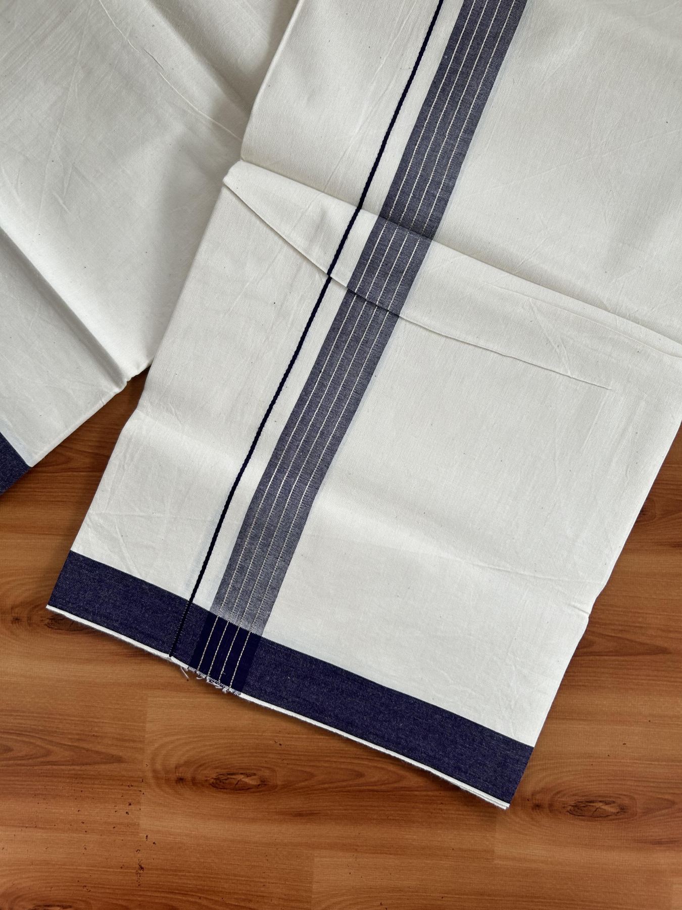 Single Mundu/Dhoti - Off White (Unbleached) 29% Discount !! KaithariKada Balaramapuram 100% Cotton Twisted 60s Thread - 1 Inch Silver Kasav & Navy Blue Shaded Striped Kara (2 meter /4 muzham) - 17 KK5393 GL