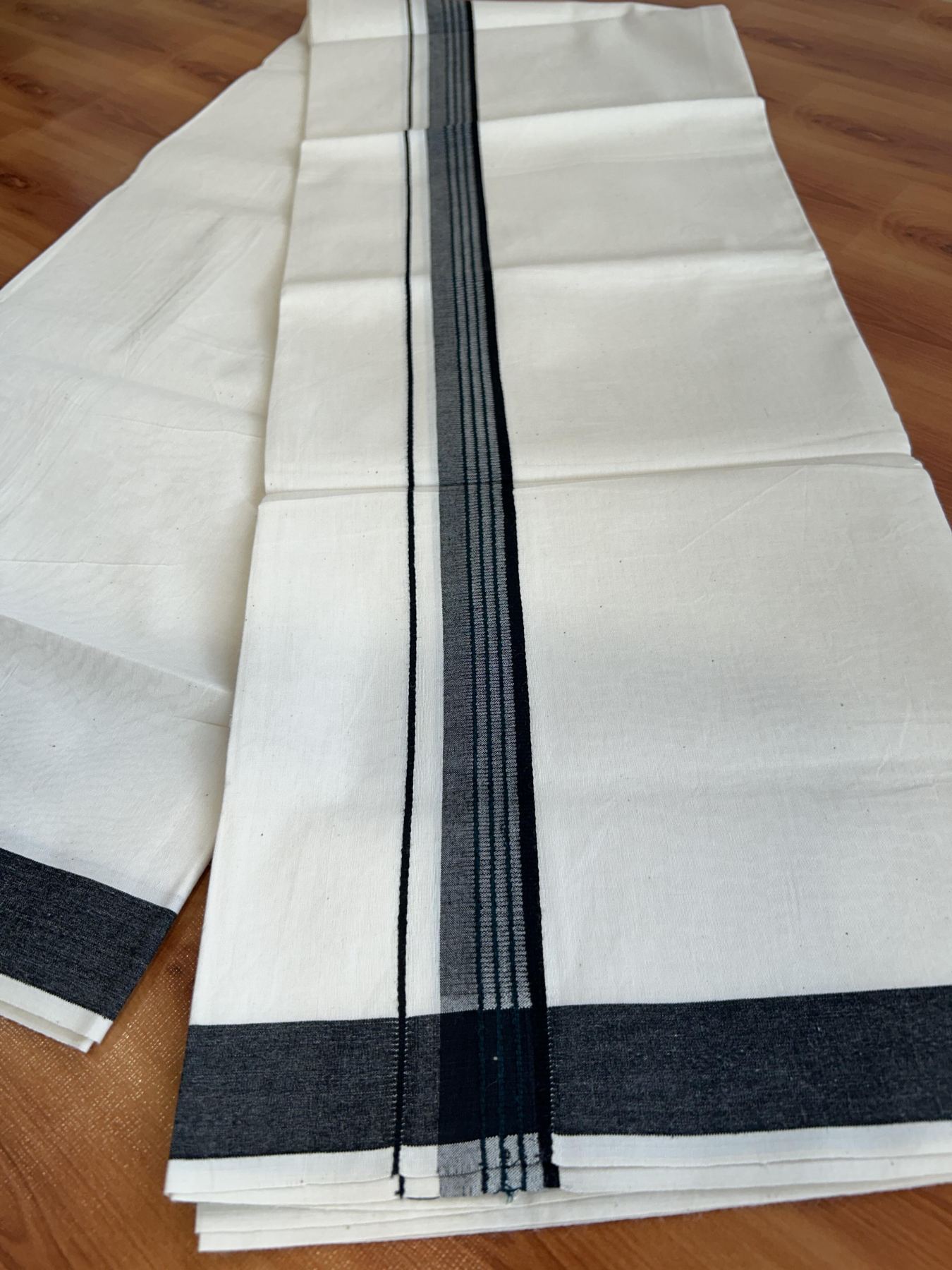 Single Mundu/Dhoti - Off White (Unbleached) 29% Discount !! KaithariKada Balaramapuram 100% Cotton Twisted 60s Thread - 1 Inch Dark Green & Black Shaded Striped Kara (2 meter /4 muzham) - 22 KK5393 GL