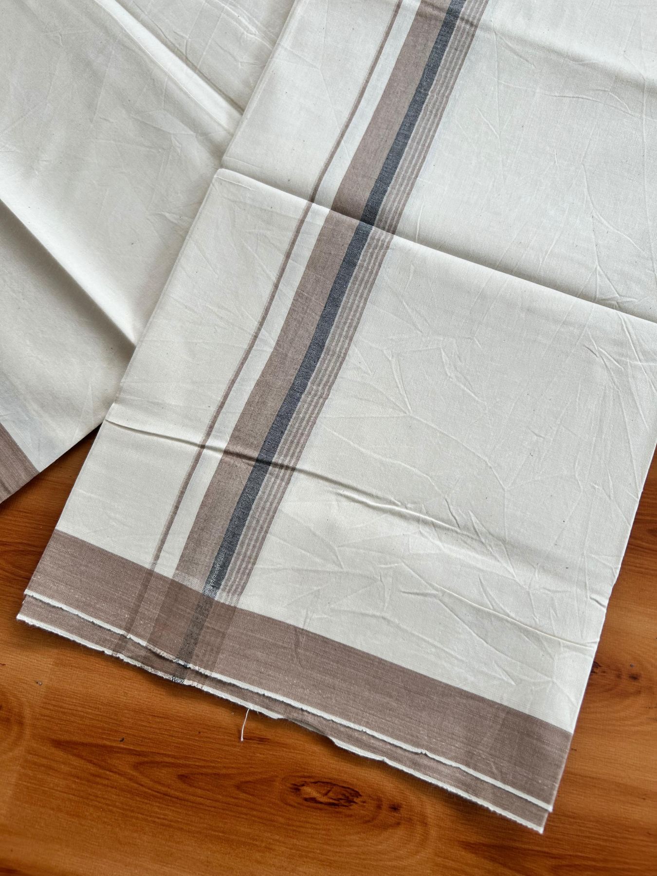 Single Off White (Unbleached) Mundu/Dhoti - 36% DISCOUNT!! KaithariKada Balaramapuram 100% Cotton - Twisted 60s Thread - 1.25 inch Silver Kasav Black & Pastel Brown Shaded Striped Kara (2 meter / 4 muzham) - 21 KK5495 GL
