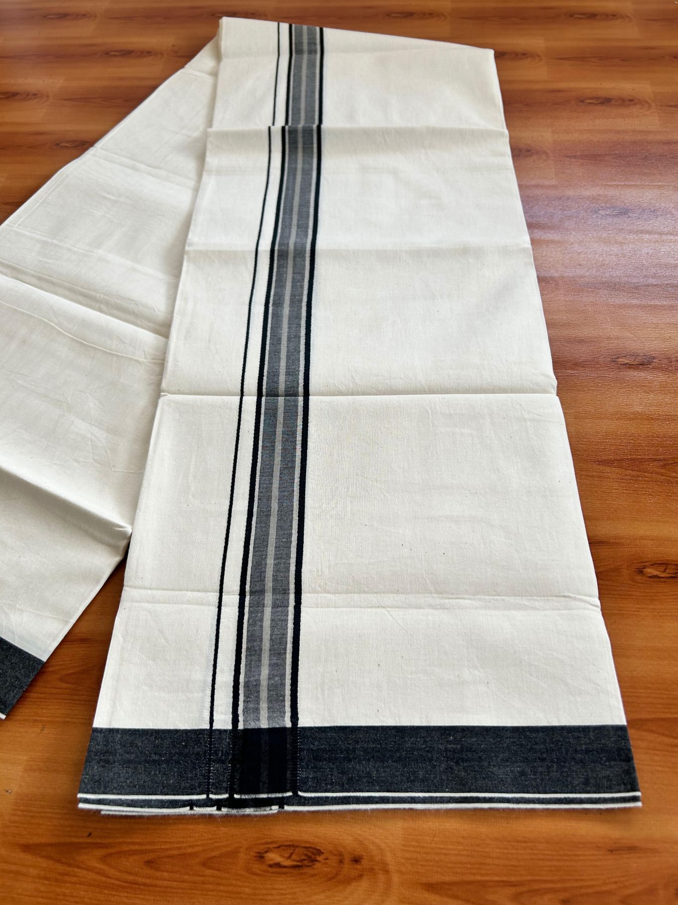 Single Off White (Unbleached) Mundu/Dhoti - 36% DISCOUNT!! KaithariKada Balaramapuram 100% Cotton - Twisted 60s Thread - 1.25 inch Silver Kasav Black Shaded Striped Kara (2 meter / 4 muzham) - 30 KK5495 GL
