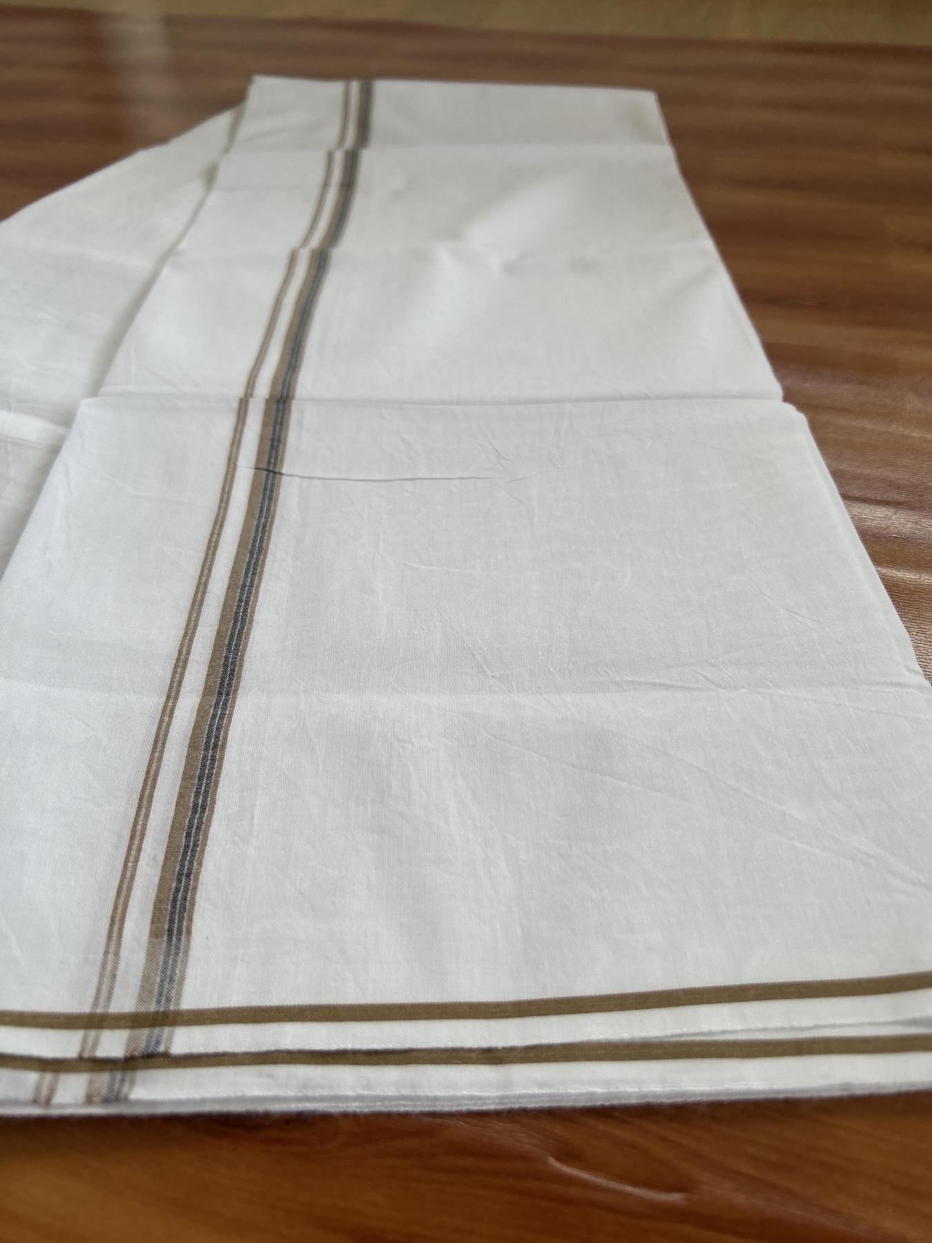 Single Mundu/Dhoti - Pure White - 29% Discount !! KaithariKada Balaramapuram 100% Cotton - Twisted 60s Thread - 0.5 Cm Silver Kasav & Black & Sand Brown Shaded Striped Kara (2 meter / 4 muzham) - 50 KK5393 GL