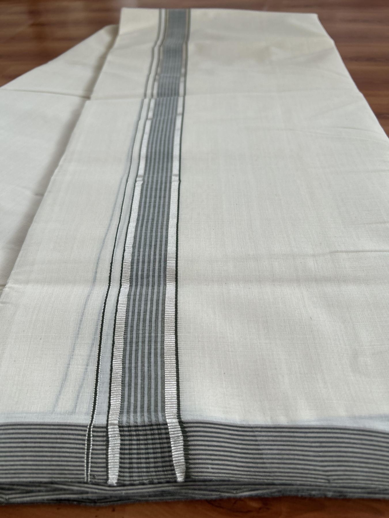 Double Off White (Unbleached) Mundu/Dhoti- 25% Discount! KaithariKada Handloom Millpaav - Kerala Handloom - Cotton - 80x90 - 1.25 inch Silver Kasav & Grey & Sage Green Shaded Striped Kara 4.50 meter (10 Muzham) -22 KK5396 RAM