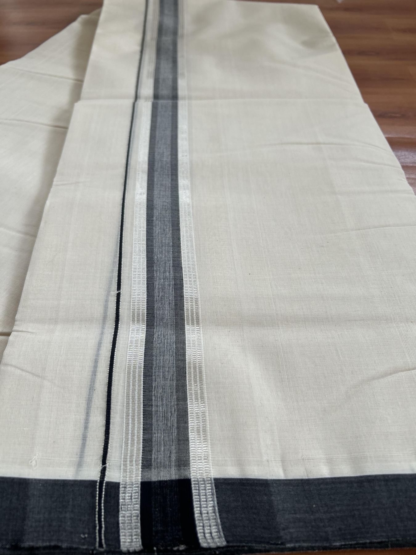 Double Off White (Unbleached) Mundu/Dhoti- 25% Discount! KaithariKada Handloom Millpaav - Kerala Handloom - Cotton - 80x90 - 1.25 inch Silver Kasav & Black Shaded Striped Kara 4.50 meter (10 Muzham) - 23 KK5396 RAM