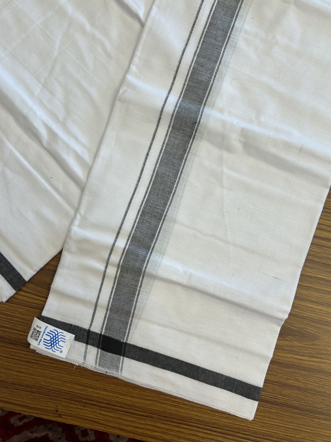 Kerala Handloom - Signature Kaitharikada - Government Sealed Hallmarked - 100% Pure Cotton 2/60X40s Thread - Light White Single Mundu / Dhoti - 1 inch Black Striped Kara - 1 KK8046 KAL