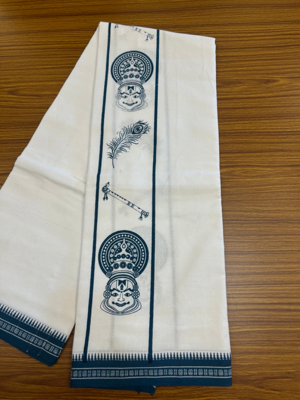 18% Discount! Kaitharikada Pure Cotton - Single Kaily / Lungi - 4 inch Peacock Blue Printed Kadhakali , Peacock Feather & Flute Kuppadam Design kara with White colour body (2 meter / 4 muzham) - 3KK8023 AS