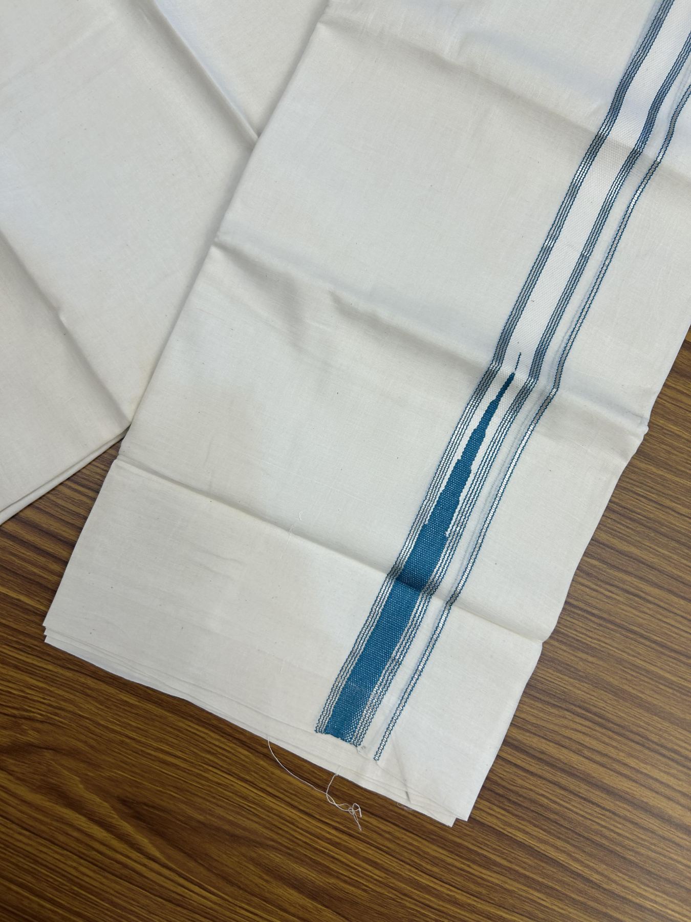 20% Discount!! KaithariKada Balaramapuram Pure Cotton Double Off White - (Unbleached) - Mundu/Dhoti - 100x80 - 1 inch Puliyilakkara Silver Kasav & Turquoise Blue Stripes One Side Chutty Kara 4 mtr (8.5 muzham) - 36 KK5357 VAS