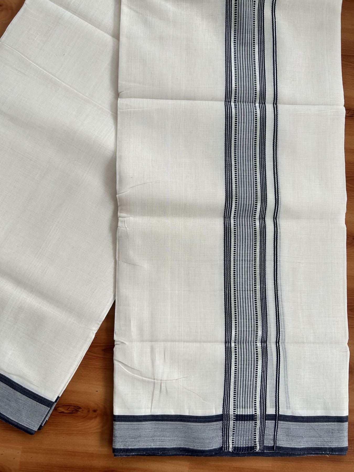 Double Off White (Unbleached) Mundu/Dhoti - 25% Discount! KaithariKada Handloom Unakkupaav Kerala Handloom - Pure Cotton - 80x90 - 1.5 Inch Silver Kasav & Navy Blue Striped Kara 4 Mtr (8.5 Muzham) - 16 KK5438 YAR