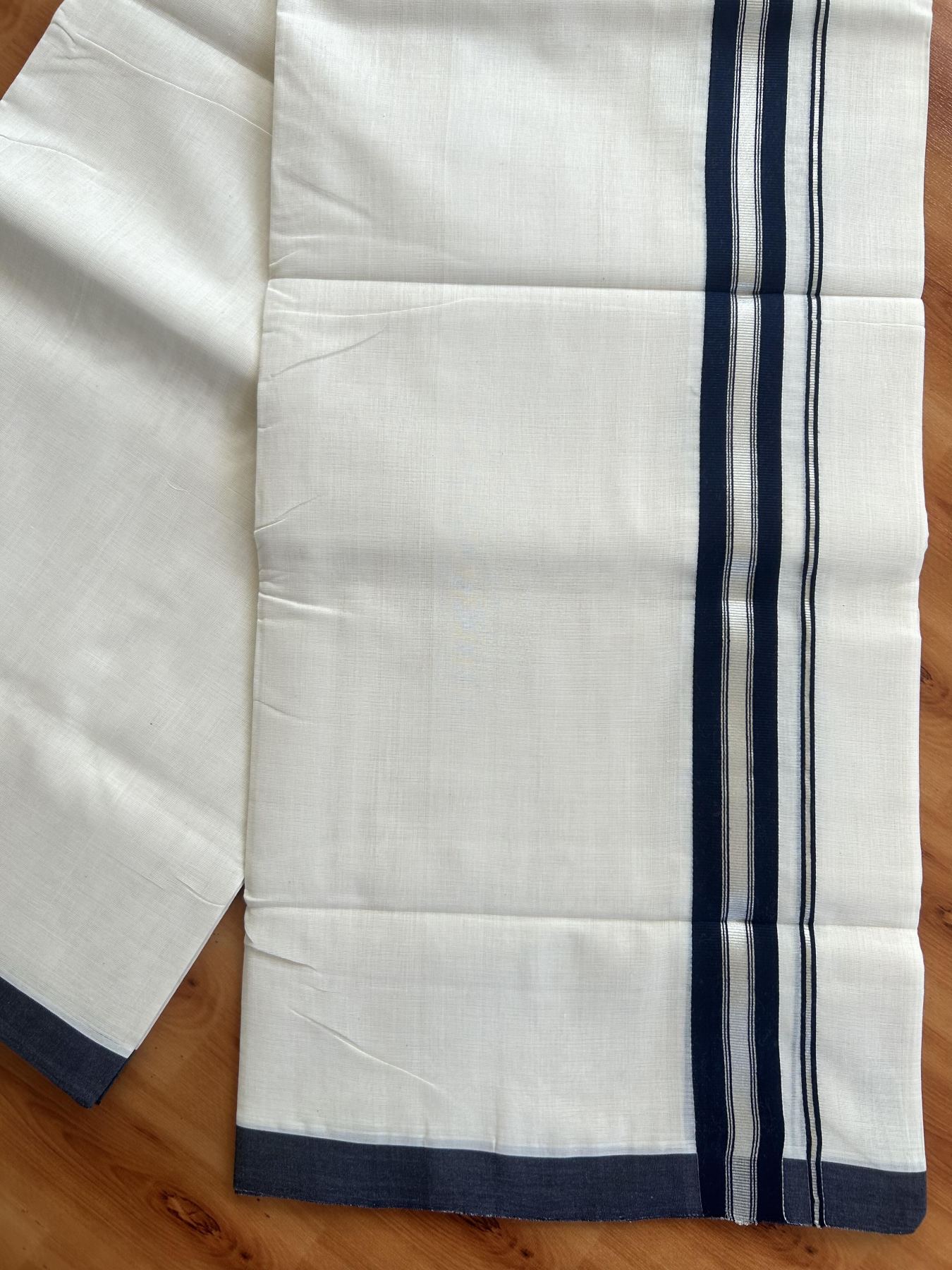 Double Off White (Unbleached) Mundu/Dhoti - 25% Discount! KaithariKada Handloom Unakkupaav Kerala Handloom - Pure Cotton - 80x90 - 1.25 Inch Silver Kasav & Navy Blue Striped Kara 4.50 Mtr (10 Muzham) - 33 KK5438 YAR