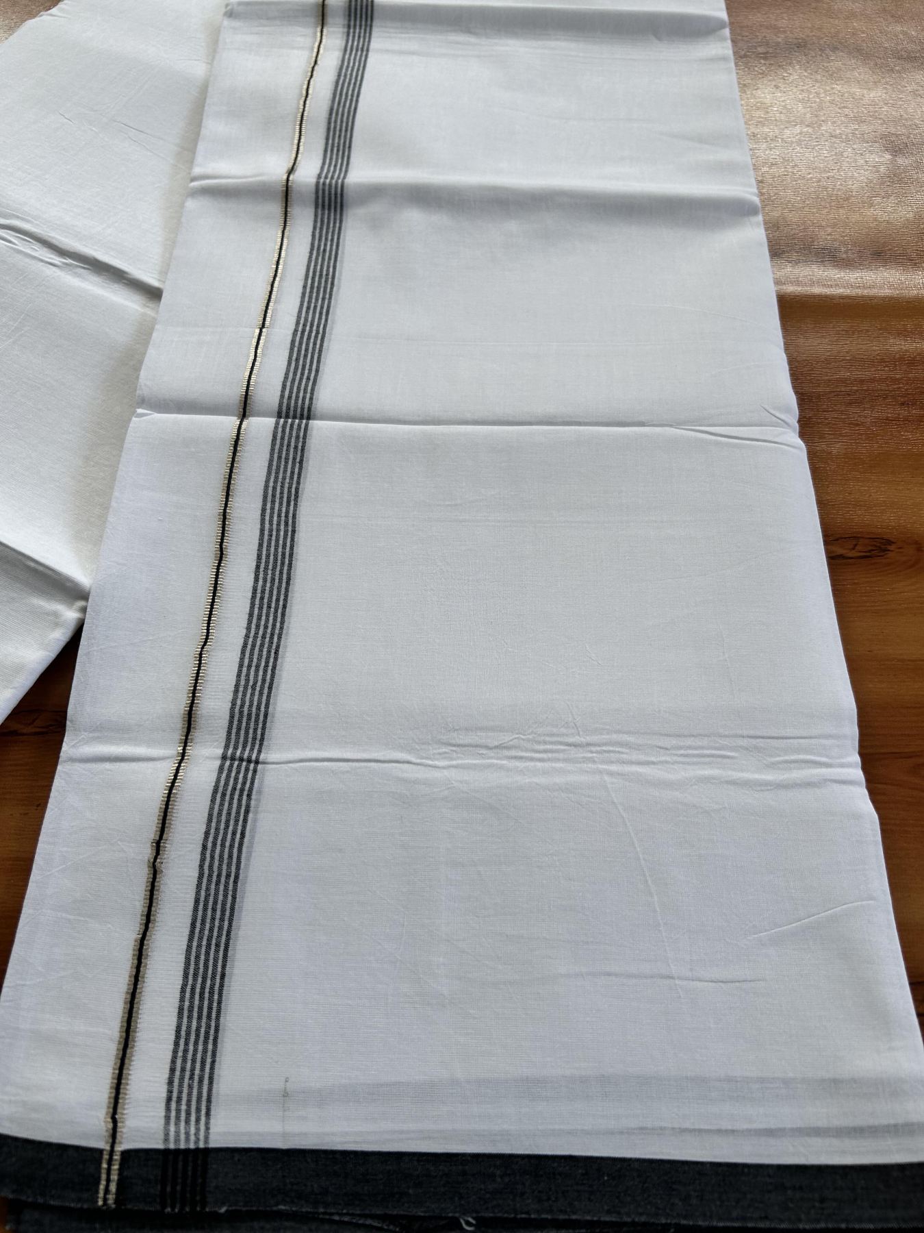 Double Pure white Mundu/Dhoti- 20% Discount ! KaithariKada Balaramapuram Pure Cotton - 100x80 - 0.5 inch Silver Kasav & Black Shaded striped Kara - 3.90 m (8 muzham) - 33 KK5444 VIN