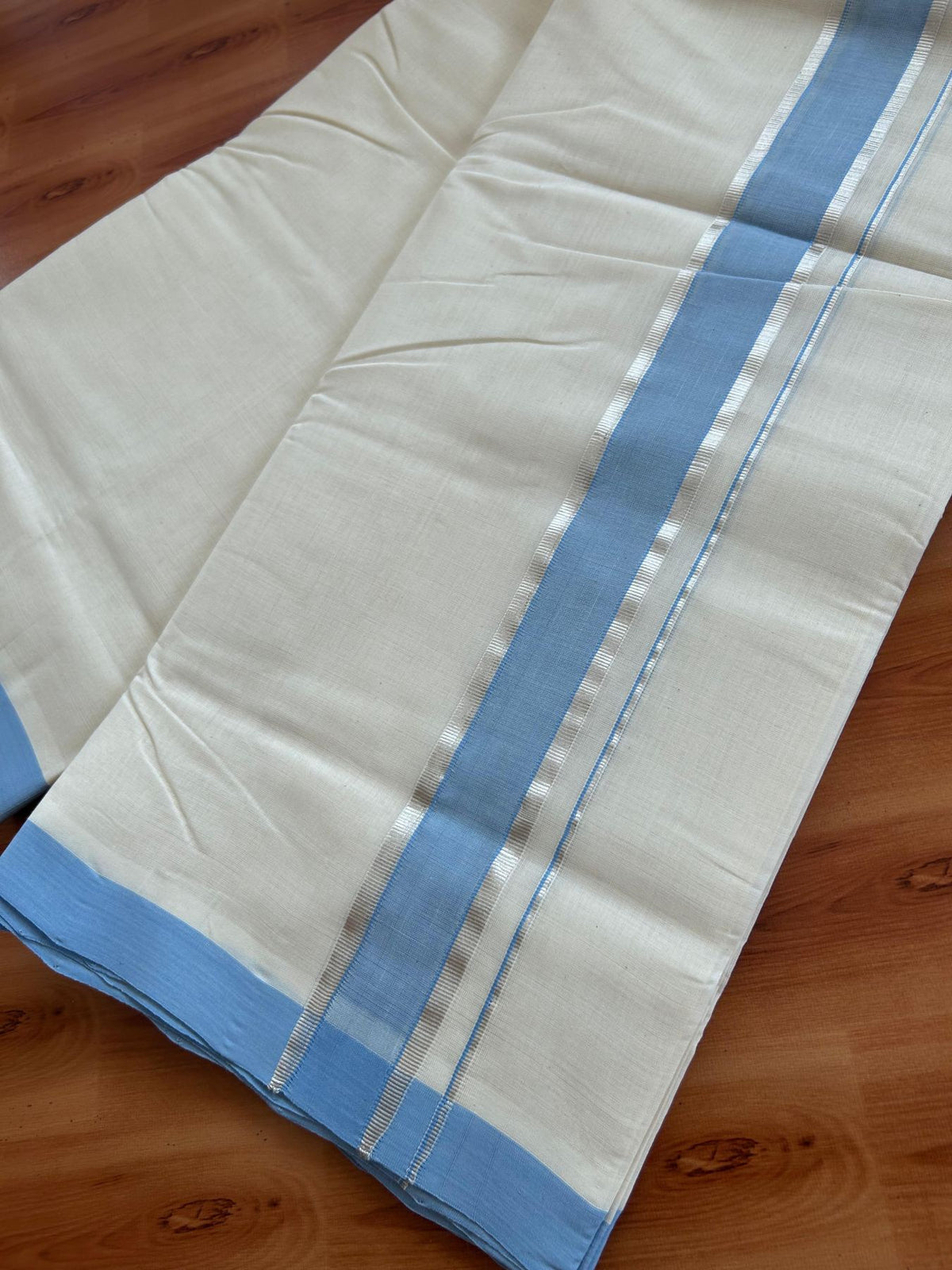 Off White (Unbleached) Double Mundu/Dhoti - 25% Discount! KaithariKada Handloom Millpaav - Kerala Handloom - 100% Pure Cotton - 80x90 - 1.5 inch Silver kasav Sky blue shaded kara 4 Meters (8.5 Muzham) - 45 KK5508 RAM