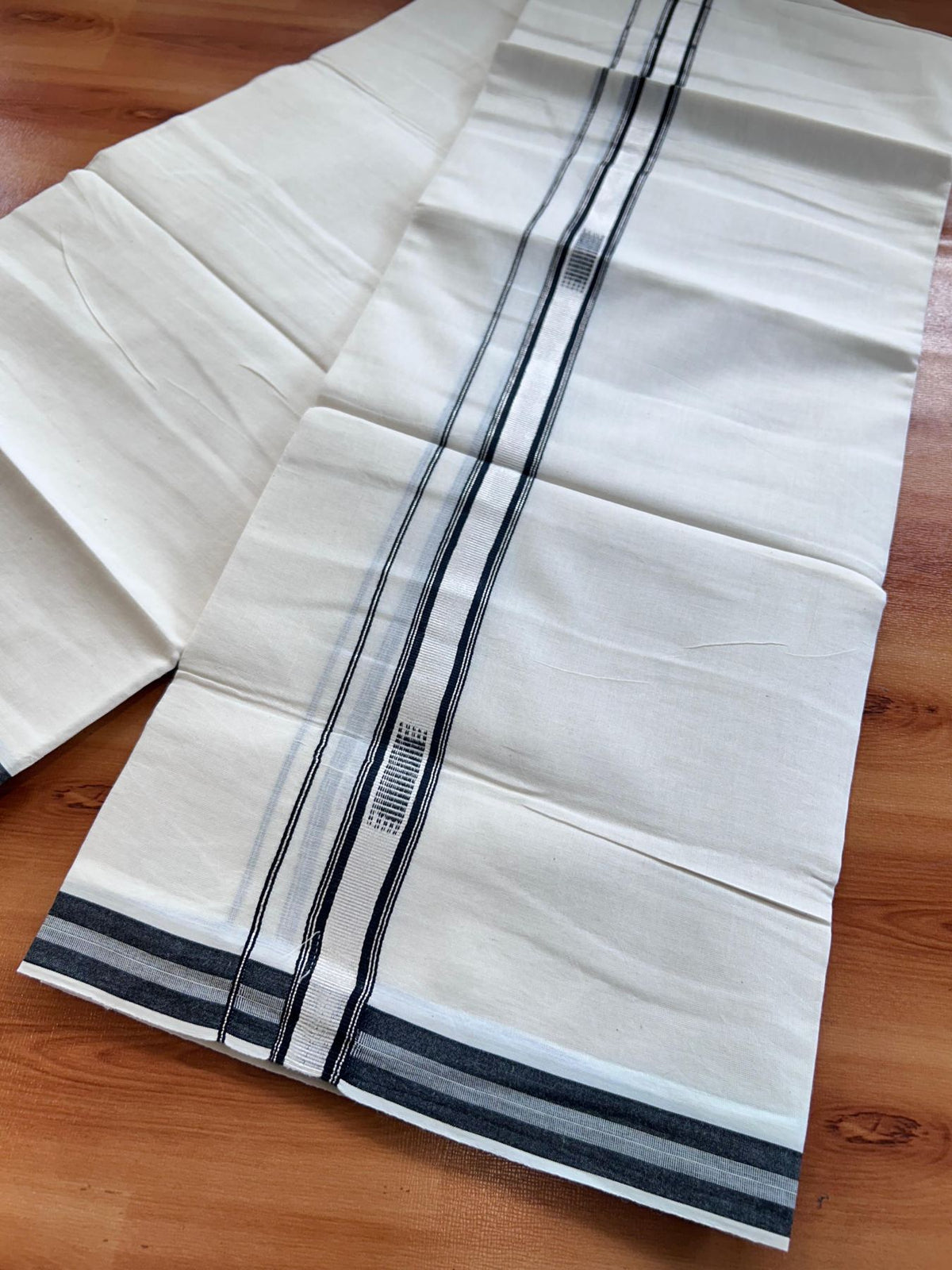 Double Off White (Unbleached) Mundu/Dhoti- 20% Discount! KaithariKada Pure Cotton - 100X80 - 1 inch Silver Kasav & Black Jaquard Design Kara - 4 mtr (8.5 Muzham) - 12 KK5510 VAS