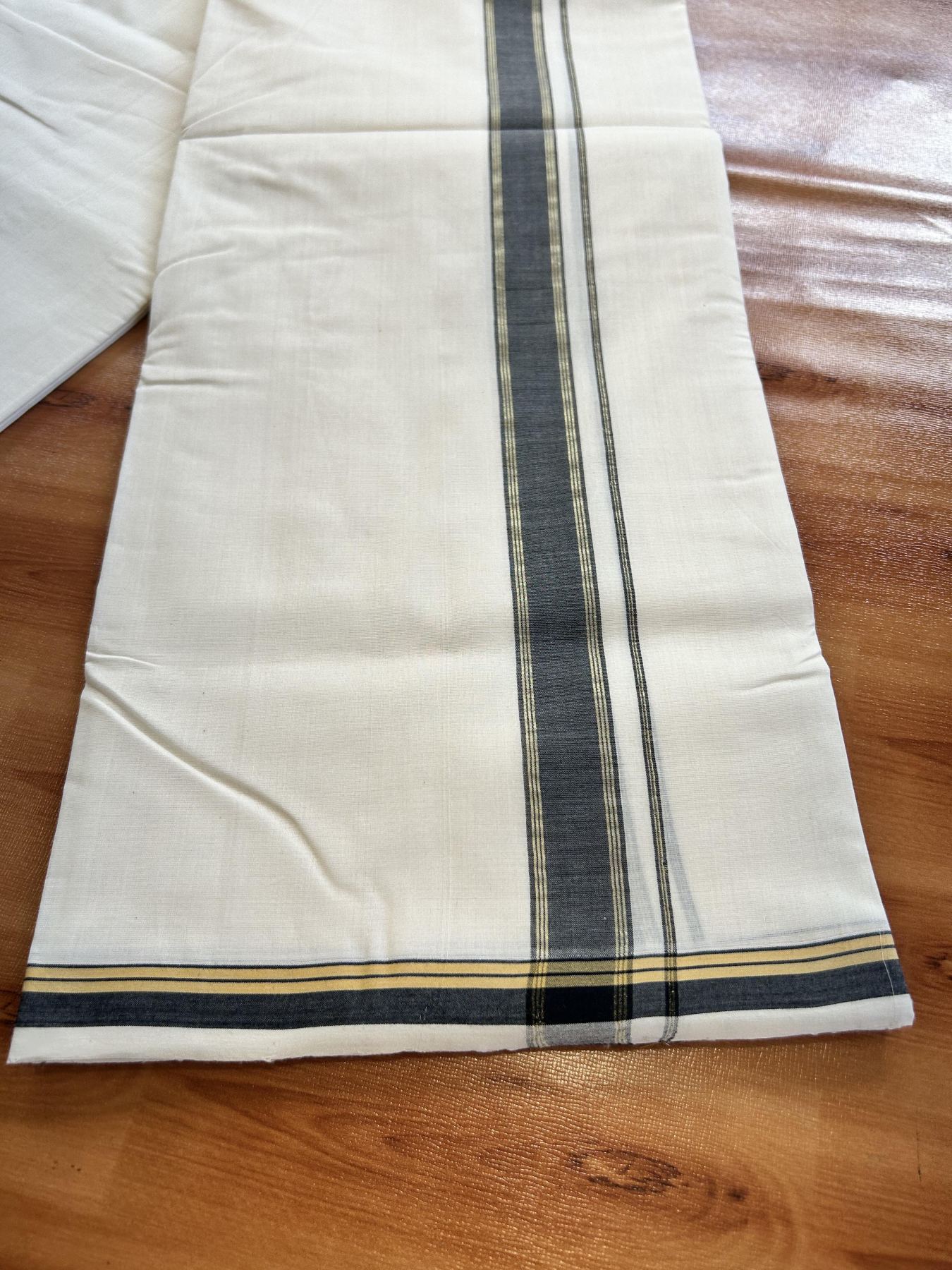 Double Off White (Unbleached) Mundu/Dhoti- 25% Discount! KaithariKada Handloom Unakkupaav - 100% Pure Cotton - 100x80 - 1 inch Ash Black Shaded Gold Kasav Pure Jerry Striped Kara 3.80 meter (8 muzham) - 56 KK5436 REA