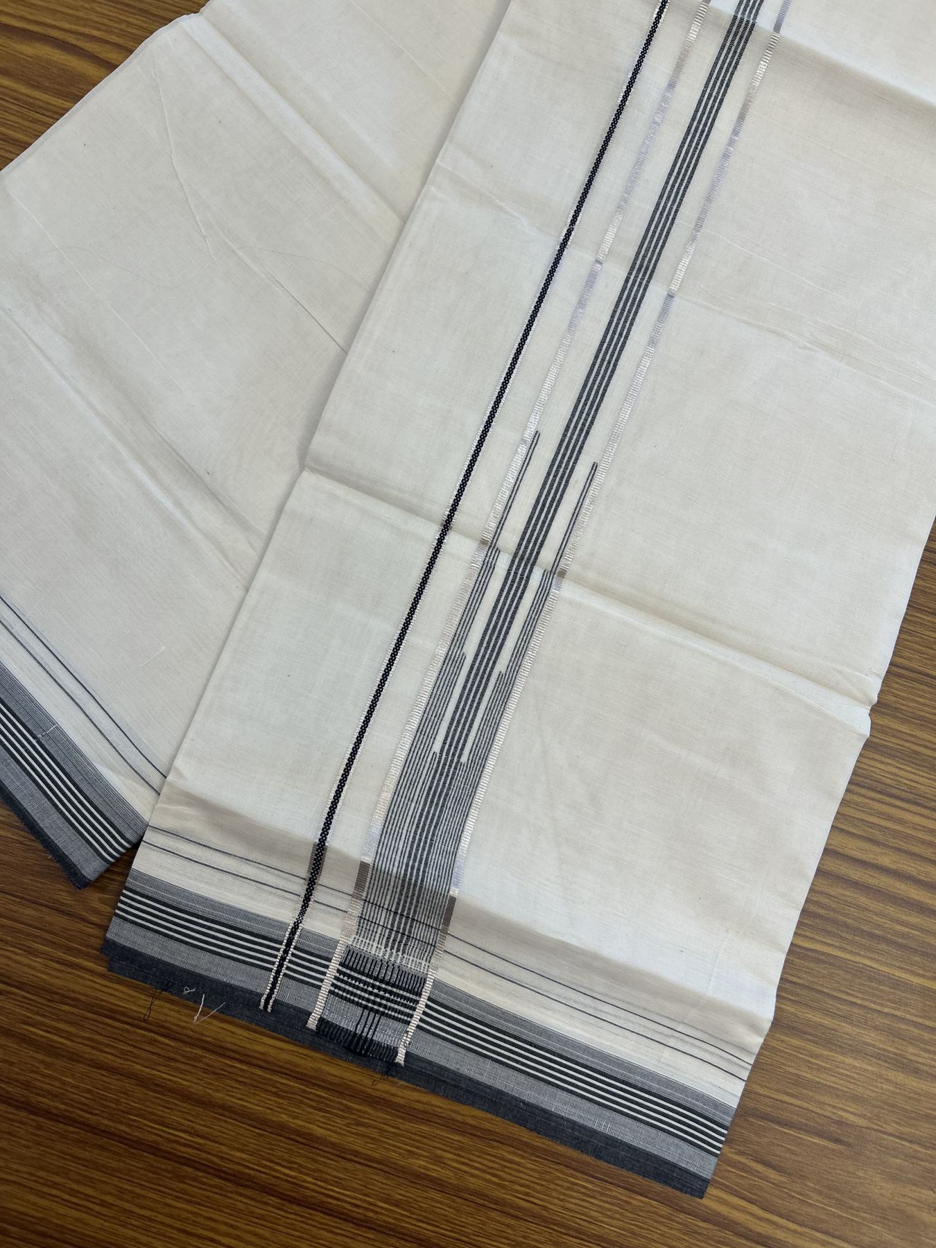 20% Discount ! KaithariKada Balaramapuram 100% Cotton Double Off White - (Unbleached) - Mundu / Dhoti- 100x80 - 1.25 inch Puliyilakkara Silver Kasav & Black shaded striped chutty Kara - 4 mtr (8.5 Muzham) - 38 KK5340 VIN