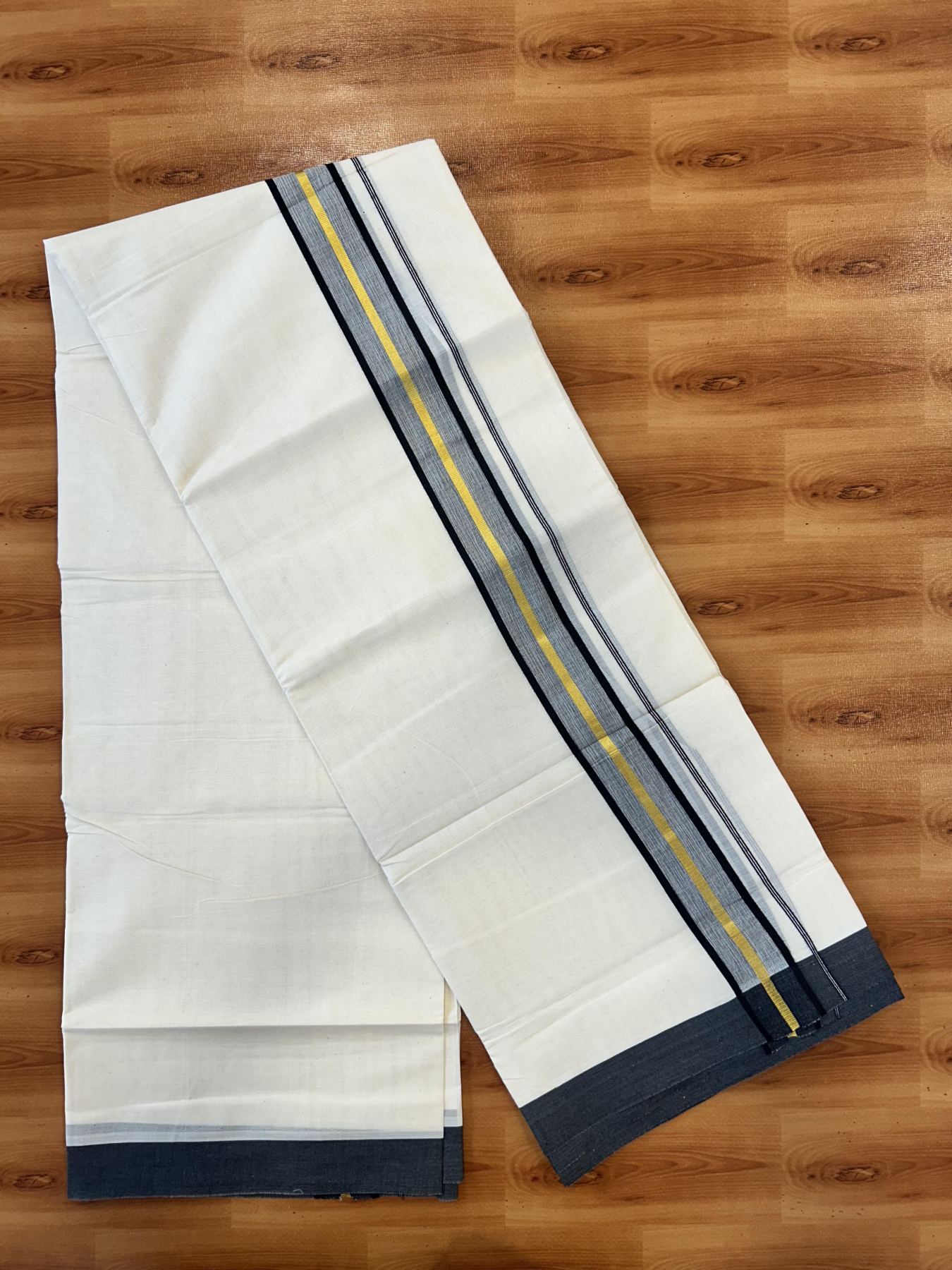Double Off White (Unbleached) Mundu/Dothi- 20% Discount! Kaitharikada 100% Pure Cotton - 100x80 - 1.75 inch Gold Kasav & Black Shaded Kara 4 mtr (8.5 muzham) - 10 KK5455 THI