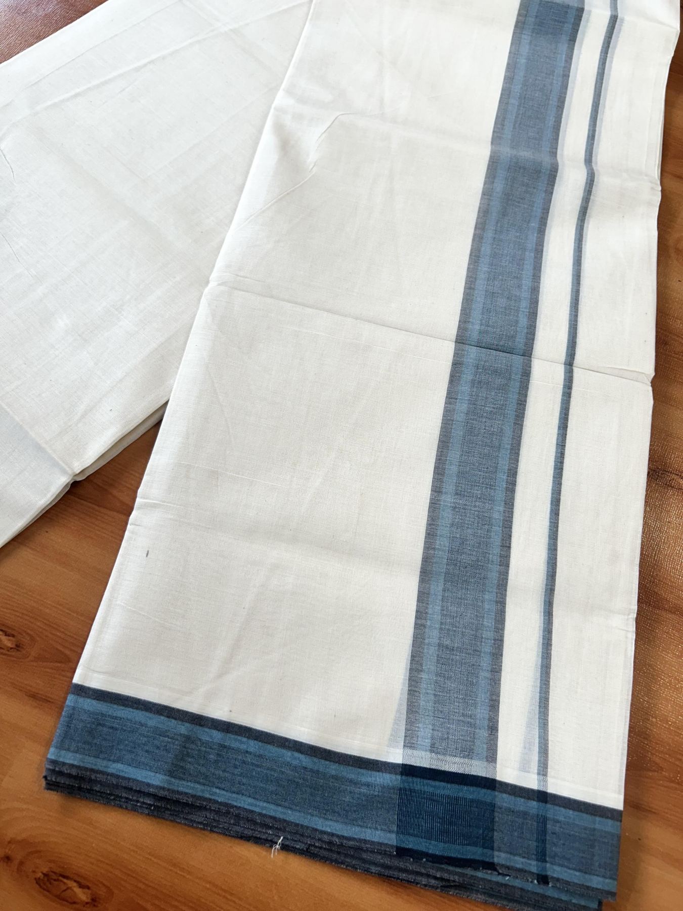 Double Off White (Unbleached) Mundu/Dhoti - 20% Discount! KaithariKada Pure Cotton - 100X80 - 1.5 inch Peacock Blue & Black Shaded Striped Kara 4 mtr (8.5 Muzham) - 71 KK5452 THI