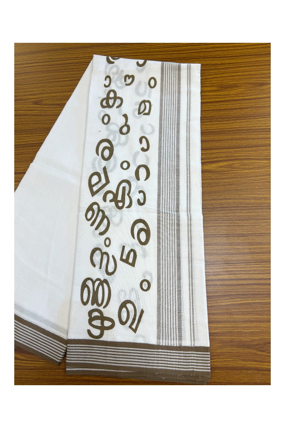6% Discount!!! Kaitharikada Pure Cotton Single PURE WHITE Kaily / Lungi -  1.75 inch Walnut Brown Striped MALAYALAM AKSHARAMALA Printed kara with White colour body (2 meter / 4 muzham) - 5KK8017AS