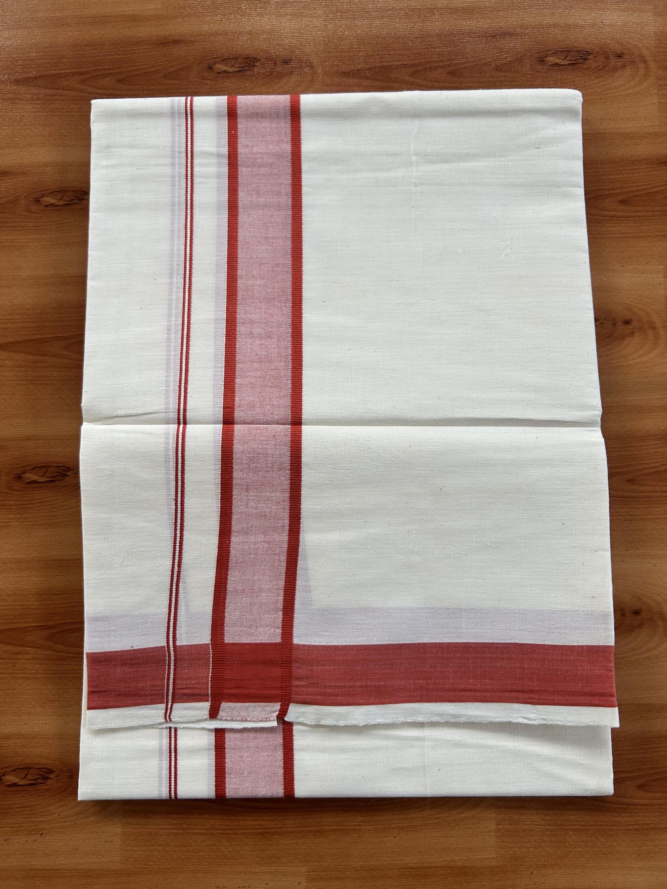 Single Off White - (Unbleached) Mundu/Dhoti - KaithariKada Balaramapuram Pure Cotton 70x30 - 1.25 inch Reddish Orange Shaded Kara (2 meter / 4 muzham) - 2 KK5409 PMC