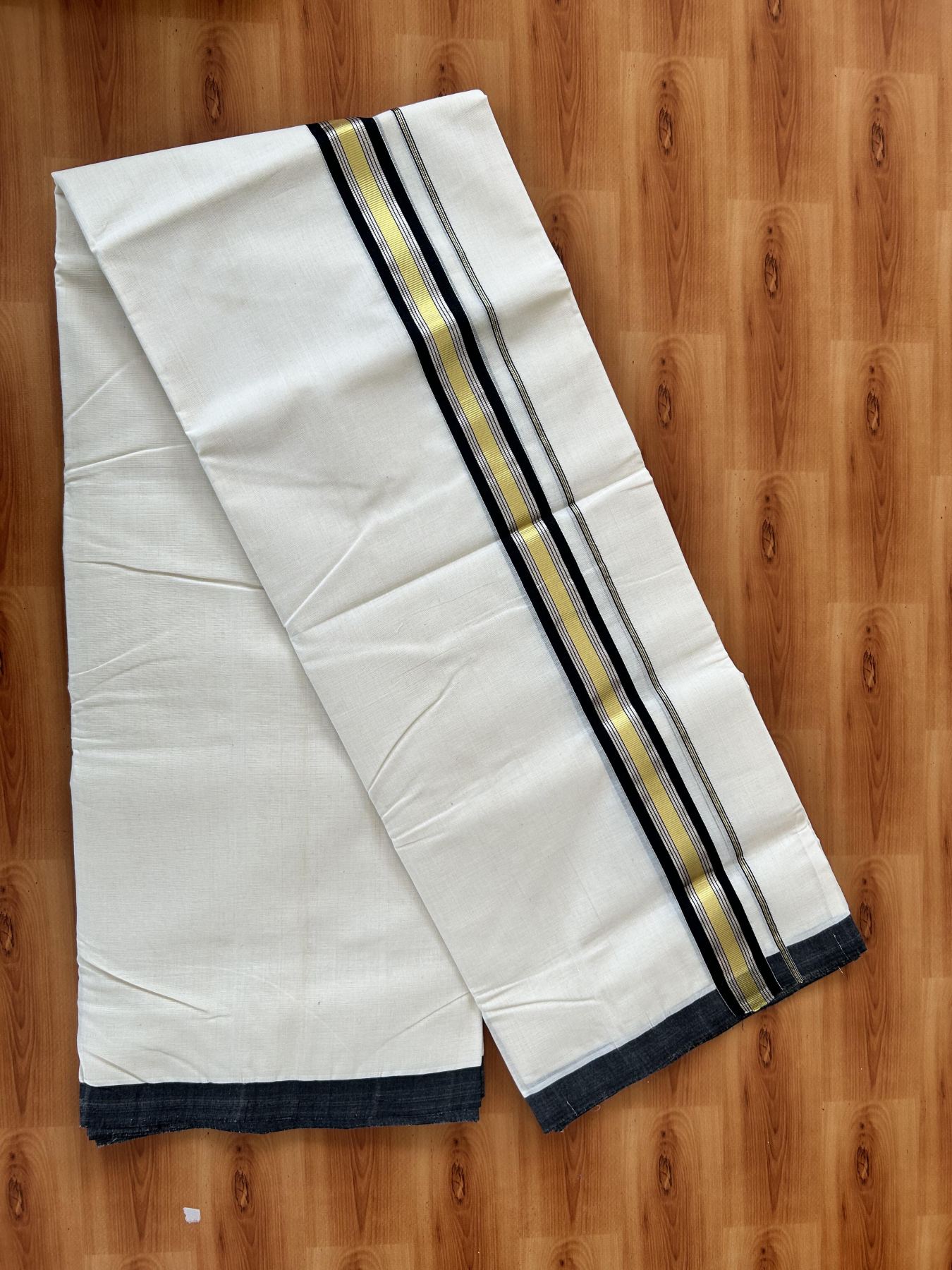 Double Off White (Unbleached) Mundu/Dhoti  25% Discount!! KaithariKada Handloom Millpaav - Kerala Handloom - 100% Pure Cotton - 80x90 - 1.25 Inch Gold Silver Kasav & Black Striped Kara - 4 mtr (8.5 Muzham) - 4 KK5459 RAM