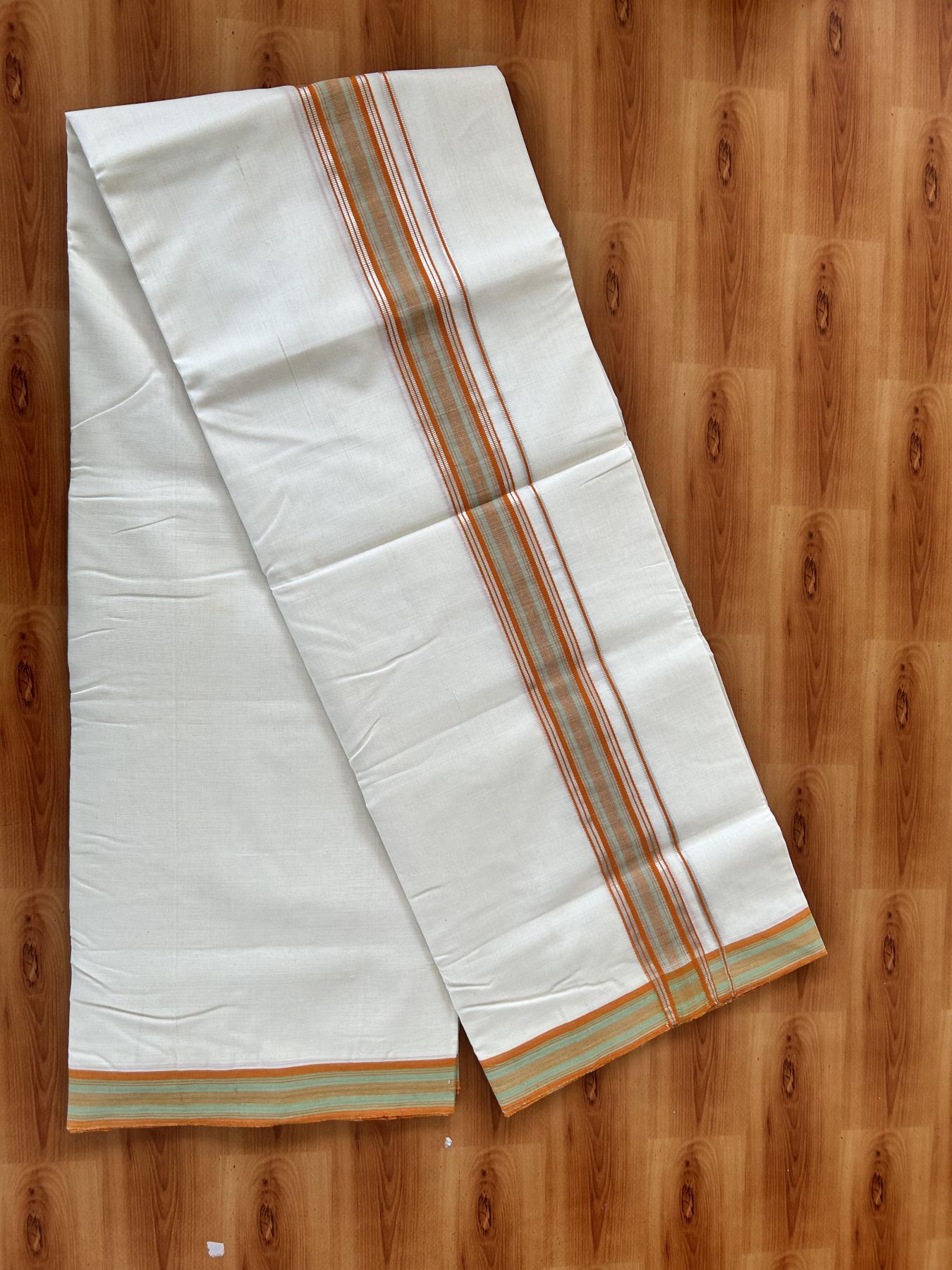 Double Off White (Unbleached) Mundu/Dhoti  25% Discount!! KaithariKada Handloom Unakkupaav - Kerala Handloom - 100% Pure Cotton - 80x90 - 1.75 Inch Silver Kasav Light Green & Orange design Striped Kara - 4 mtr (8.5 Muzham) - 11 KK5459 ABH