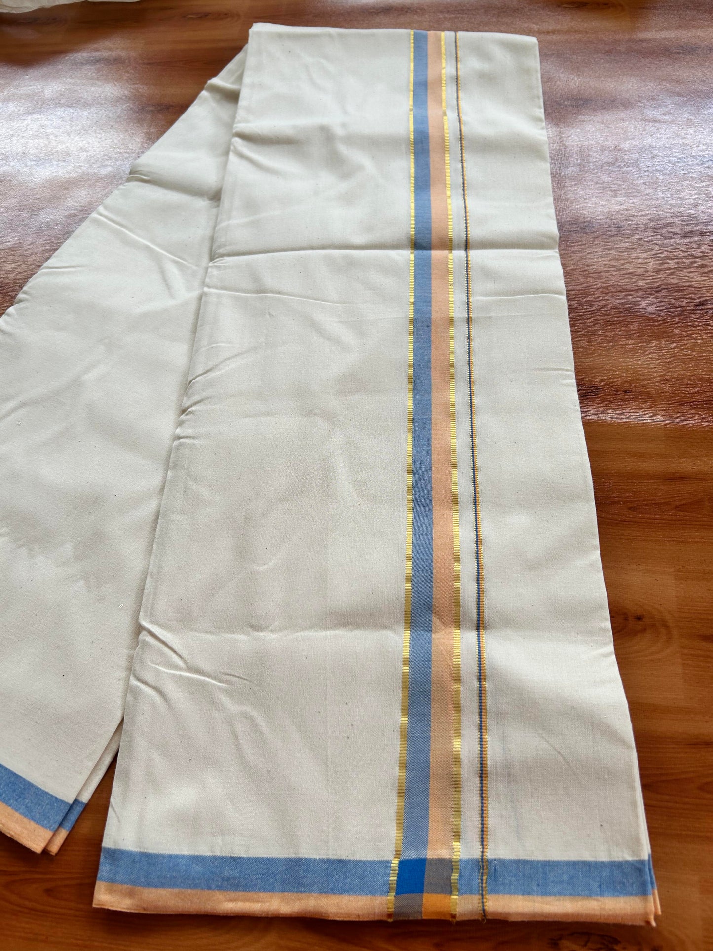 Single Off White - (Unbleached) Mundu/Dhoti - 25%Discount !! Signature Kaitharikada Exclusive Single Dhoti - 100% Cotton - Kerala Handloom - 1 inch Gold Kasav Peach Orange & Blue Shaded kara (2 meter / 4 muzham)- 4 KK5410 KAI