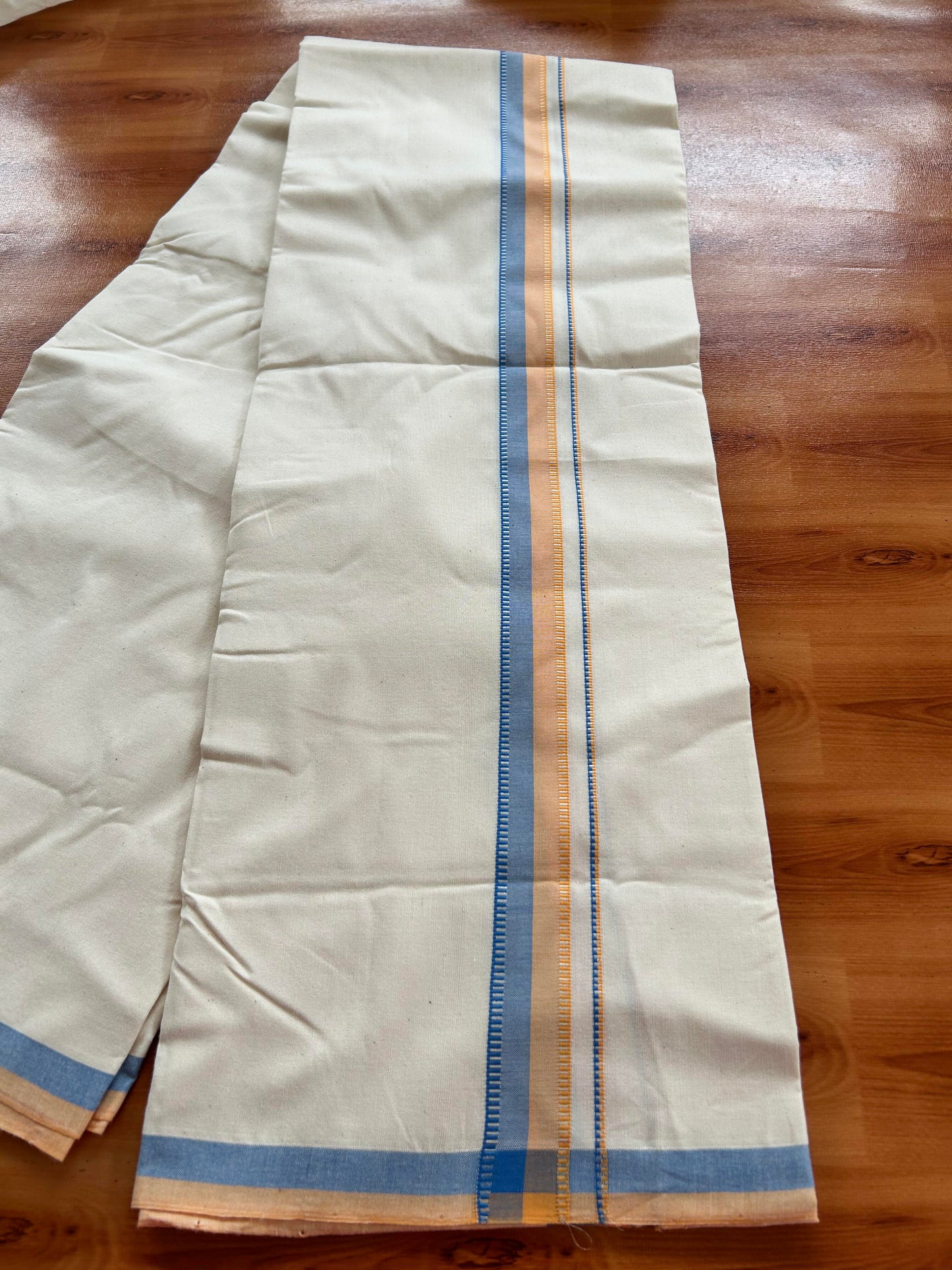 Single Off White - (Unbleached) Mundu/Dhoti - 25%Discount !! Signature Kaitharikada Exclusive Single Dhoti - 100% Cotton - Kerala Handloom - 1.25 inch Silver Kasav Peach Orange & Blue Shaded kara (2 meter / 4 muzham)- 5 KK5410 KAI