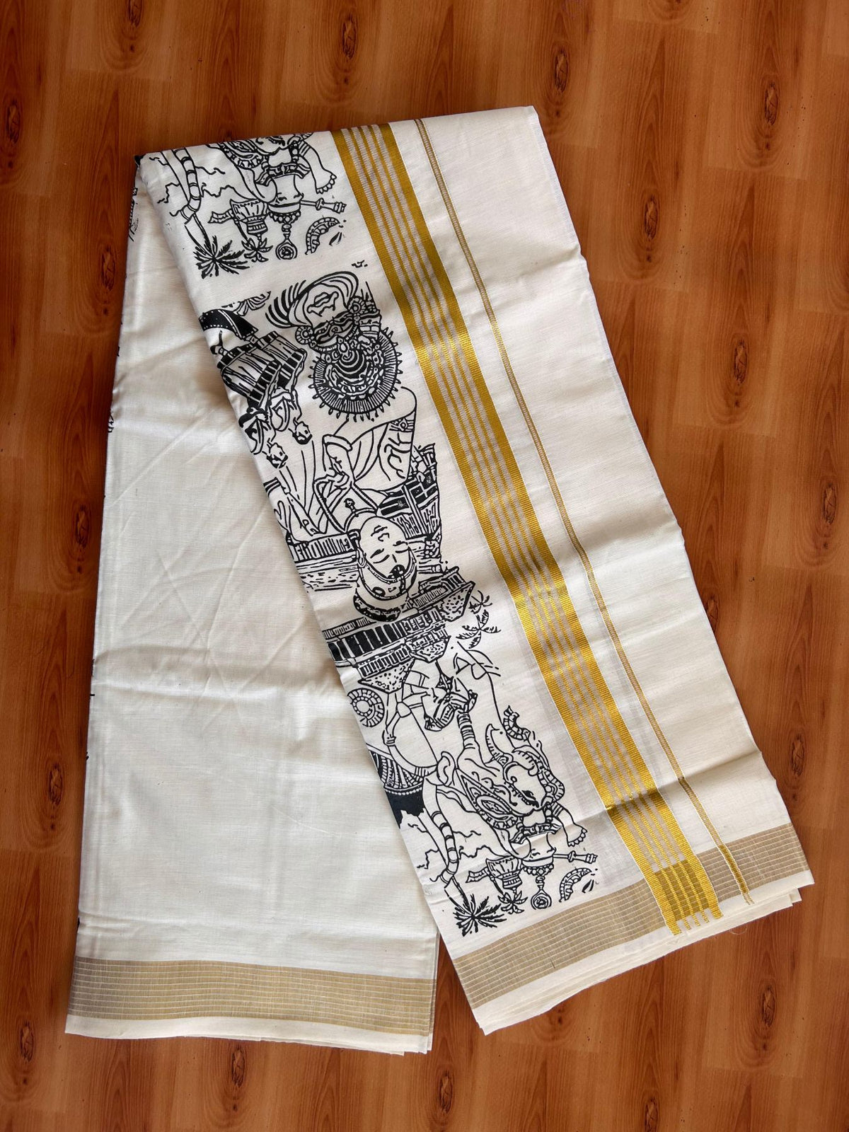 Double Off White (Unbleached) Mund/Dhoti - 20% Discount! KaithariKada Mixed Cotton - 60s - 1.5 inch Gold Kasav Striped Kara with Black Kerala Traditional Printed Design 4 mtr (8.5 Muzham) - 55 KK5520 PMC