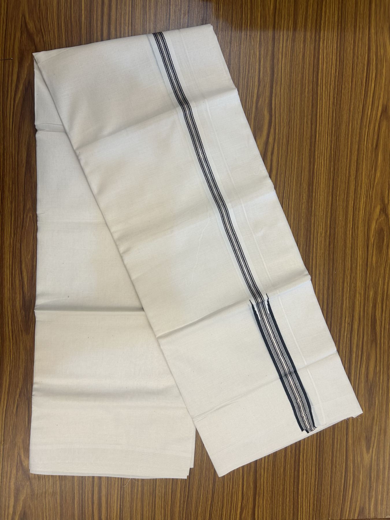20% Discount!! KaithariKada Balaramapuram Pure Cotton Double Off White - (Unbleached) - Mundu/Dhoti - 100x80 - 1 inch Puliyilakkara Silver Kasav & Black Stripes One Side Chutty Kara 4 mtr (8.5 muzham) - 34 KK5311 VAS