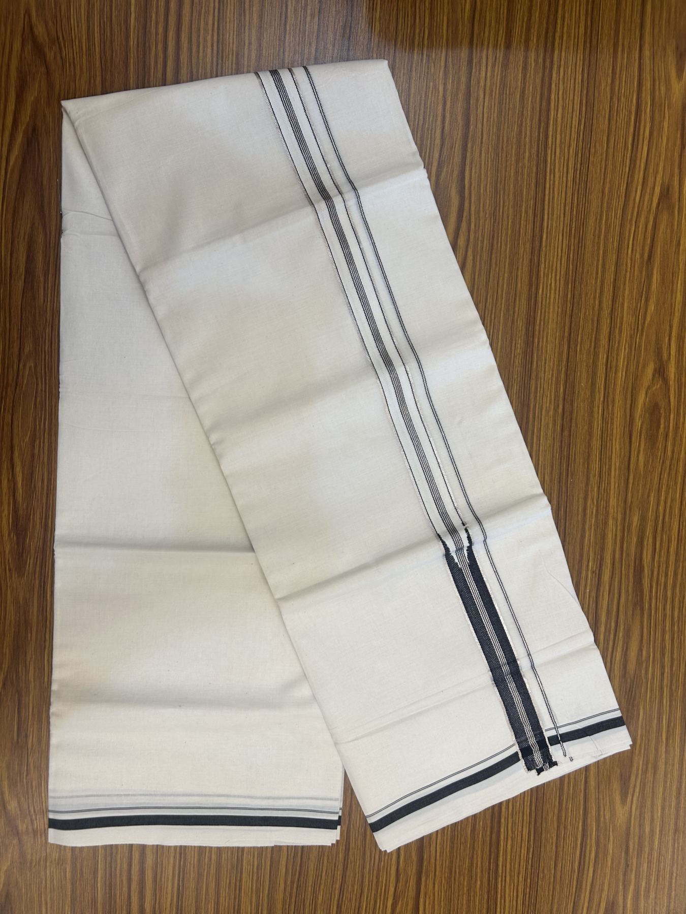 20% Discount!! KaithariKada Balaramapuram Pure Cotton Double Off White - (Unbleached) - Mundu/Dhoti - 100x80 - 1 inch Puliyilakkara Silver Kasav & Black Stripes One Side Chutty Kara 4 mtr (8.5 muzham) - 38 KK5311 VAS