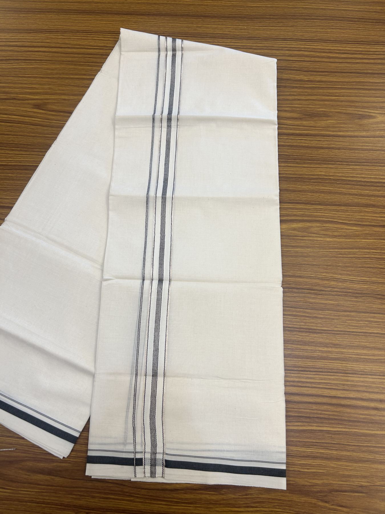 20% Discount!! KaithariKada Balaramapuram Pure Cotton Double Off White - (Unbleached) - Mundu/Dhoti - 100x80 - 1 inch Puliyilakkara Silver Kasav & Black Stripes One Side Chutty Kara 4 mtr (8.5 muzham) - 38 KK5311 VAS