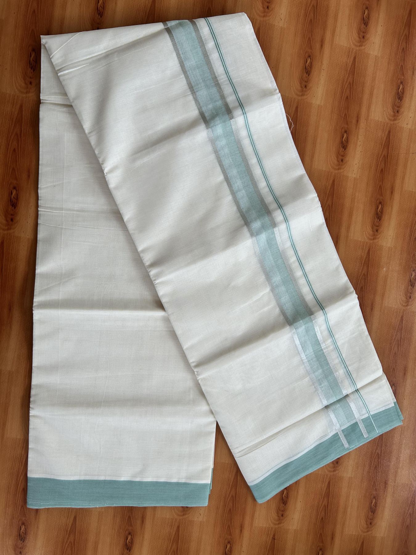 Double Off White (Unbleached) Mundu/Dhoti - 20% Discount! Kaitharikada Pure Cotton - 60s - 1.5 Inch Silver Kasav & Pastel Green Shaded Kara 4 mtr (8.5 muzham) - 48 KK5460 PMC