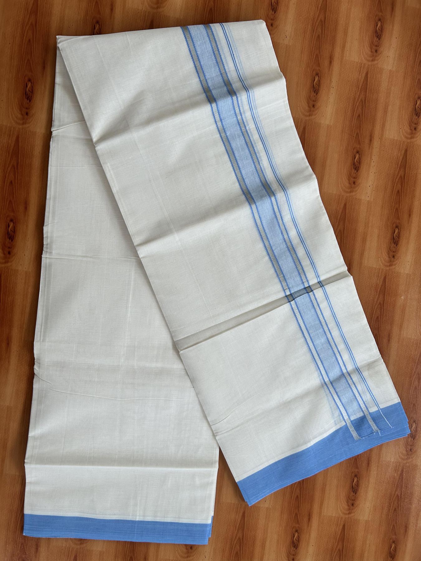 Double Off White (Unbleached) Mundu/Dhoti - 20% Discount! Kaitharikada Pure Cotton - 60s - 1.25 inch Silver Kasav & Light Blue Shaded Striped Kara 4 mtr (8.5 muzham) - 30 KK5460 PMC