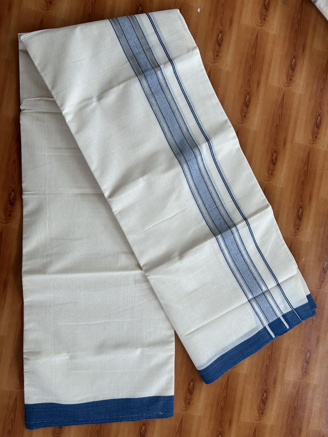 Double Off White (Unbleached) Mundu/Dhoti - 20% Discount! Kaitharikada Pure Cotton - 60s - 1.75 inch Silver Kasav & Peacock Blue Shaded Striped Kara 4 mtr (8.5 muzham) - 42 KK5460 PMC