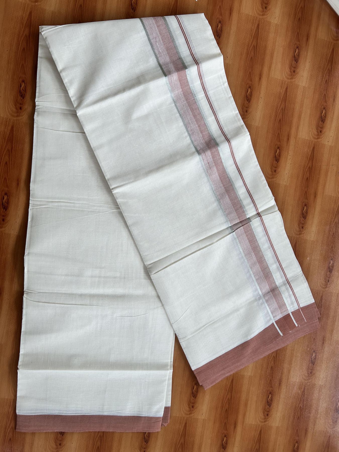Double Off White (Unbleached) Mundu/Dhoti - 20% Discount! Kaitharikada Pure Cotton - 60s - 1.5 Inch Silver Kasav & Brownish Peach Shaded Kara 4 mtr (8.5 muzham) - 50 KK5460 PMC