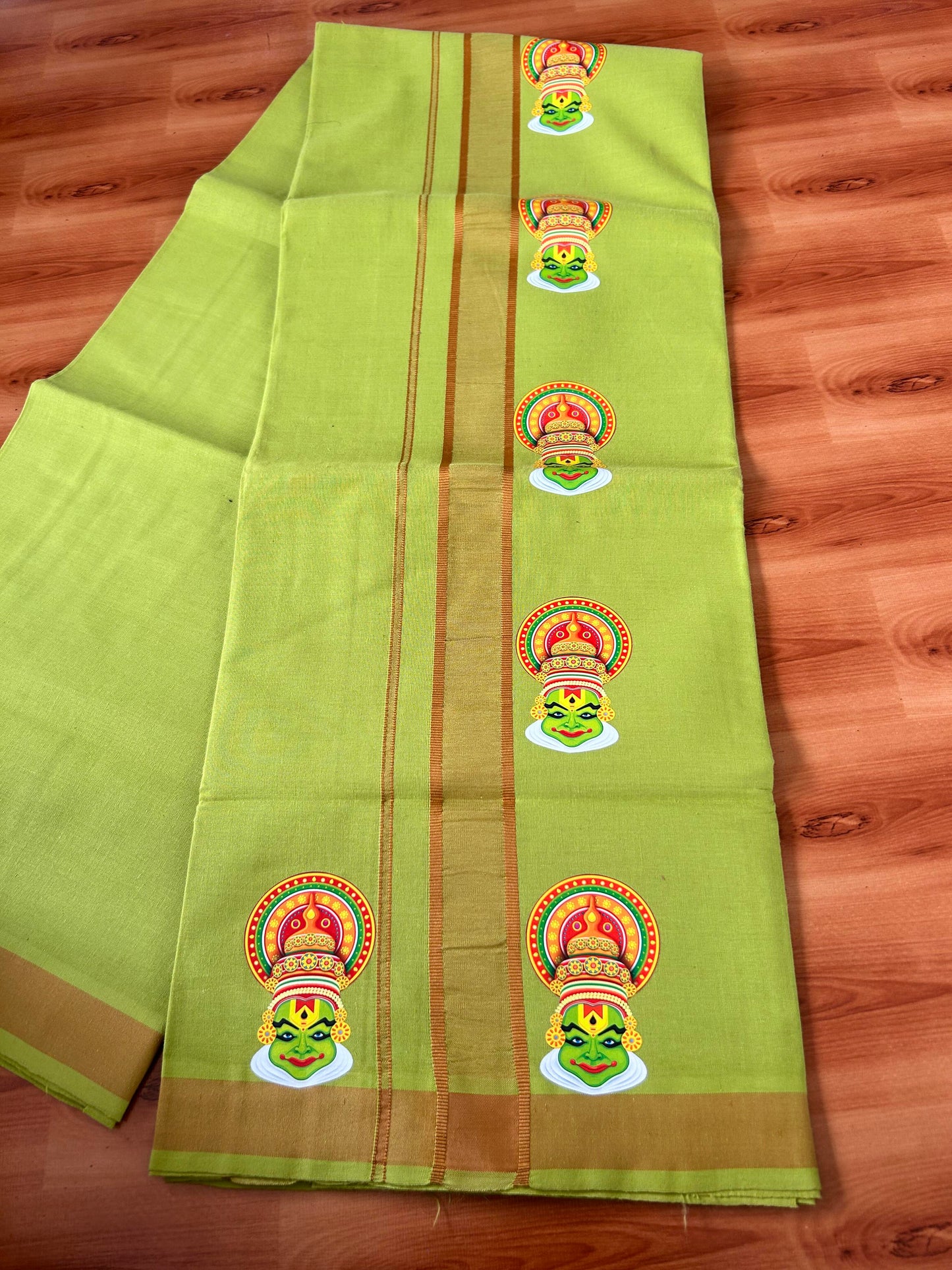 Single Kaily / Lungi- 20% Discount !! Kaitharikada - Pure Cotton - (40s) - 1.25 inch Light Orange Shaded kathakali Printed Design Kara with Parrot Green colour Body (2 meter / 4 muzham) - 3 KK8059 GAN