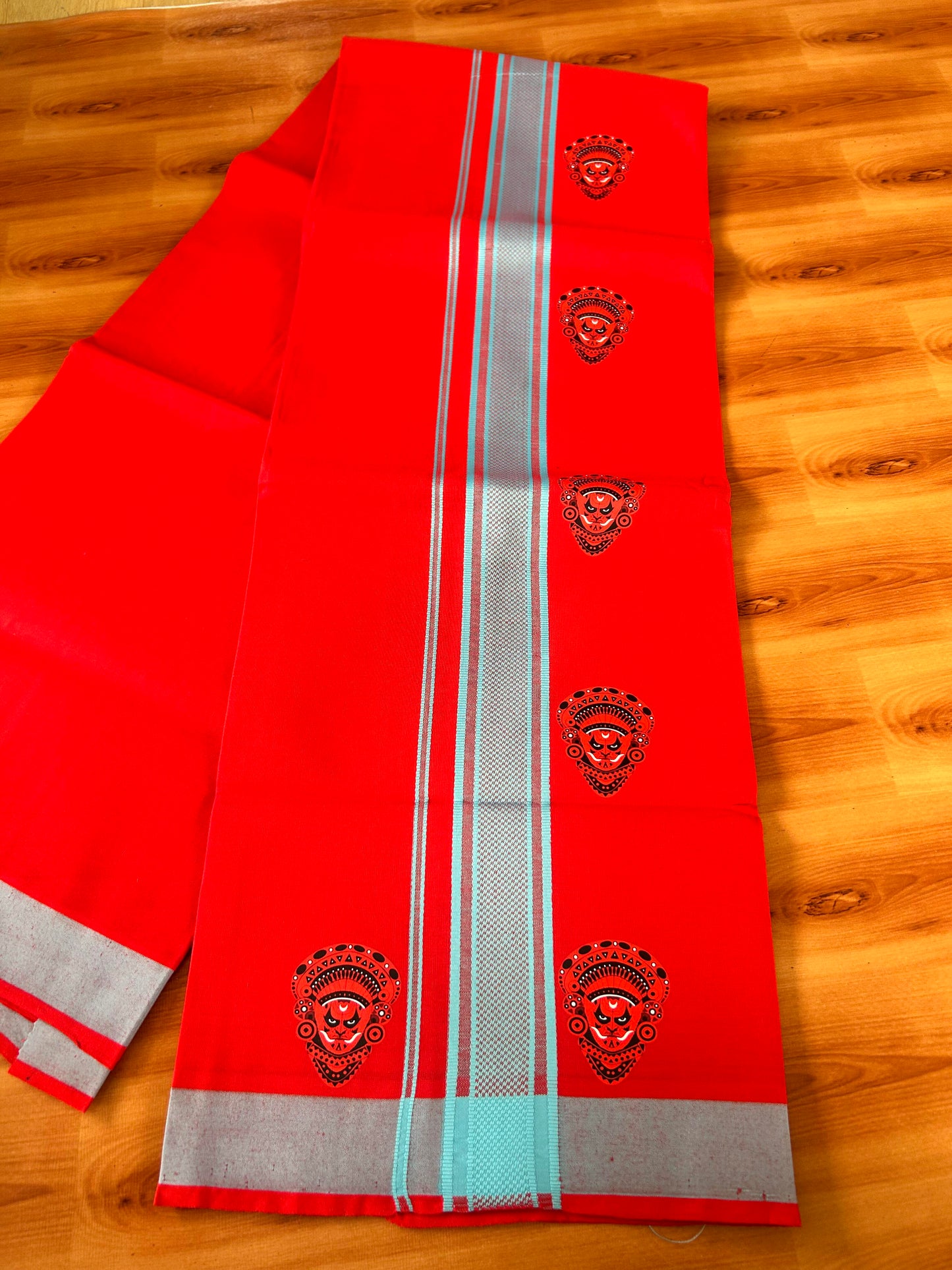 Single Kaily / Lungi- 20% Discount !! Kaitharikada - Pure Cotton - (40s) - 1.25 inch Light Blue Striped Theyyam Printed Design Kara with Chilly Red colour Body (2 meter / 4 muzham) - 22 KK8059 GAN