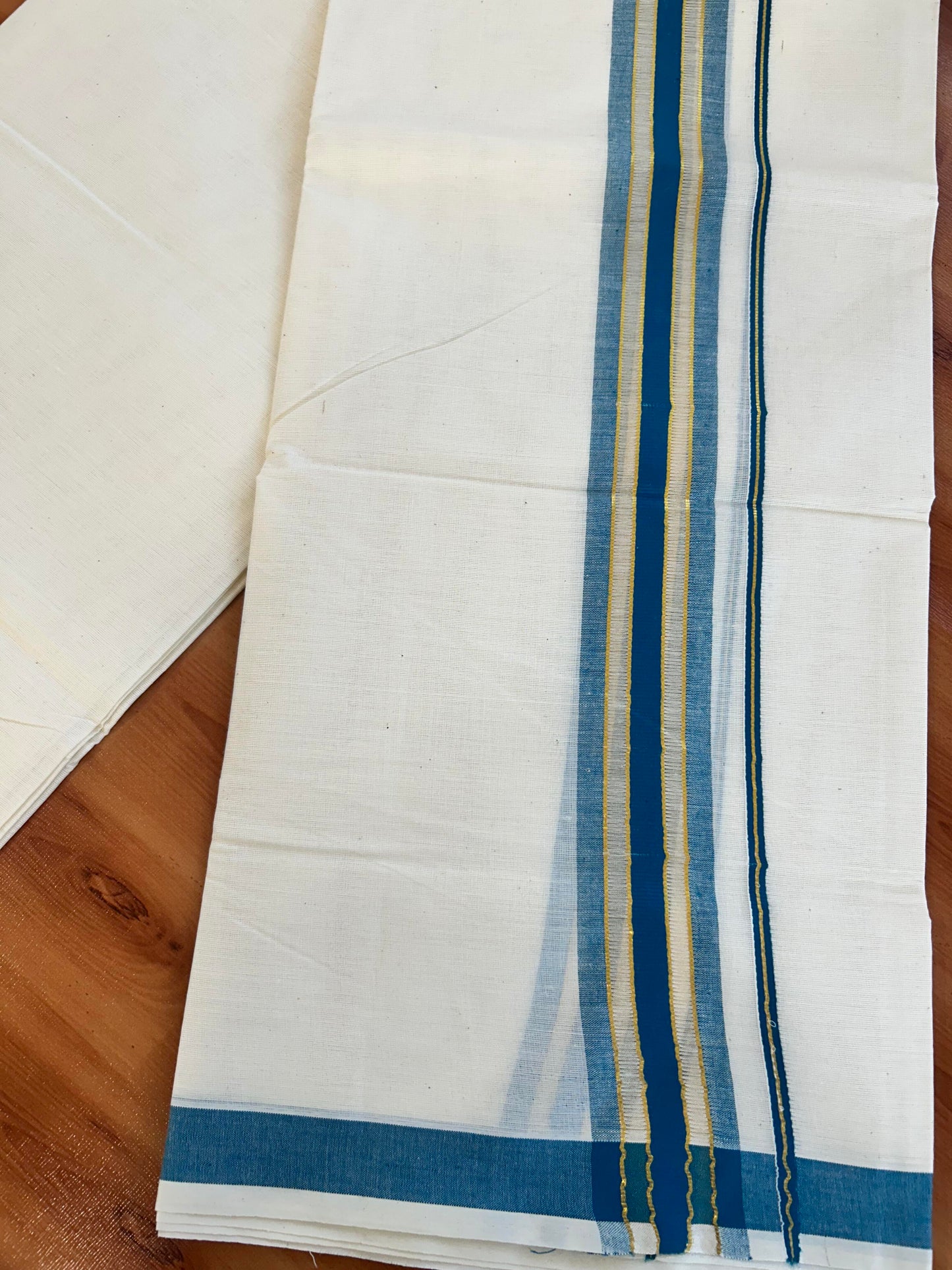 Double Off White - (Unbleached) Mundu/Dhoti - 20% Discount! KaithariKada Balaramapuram Mixed Cotton - 60s - 1.5 inch Gold Kasav & Tissue Peacock Blue Striped Kara - 4 mtr (8.5 Muzham) - 23 KK5413 GAN