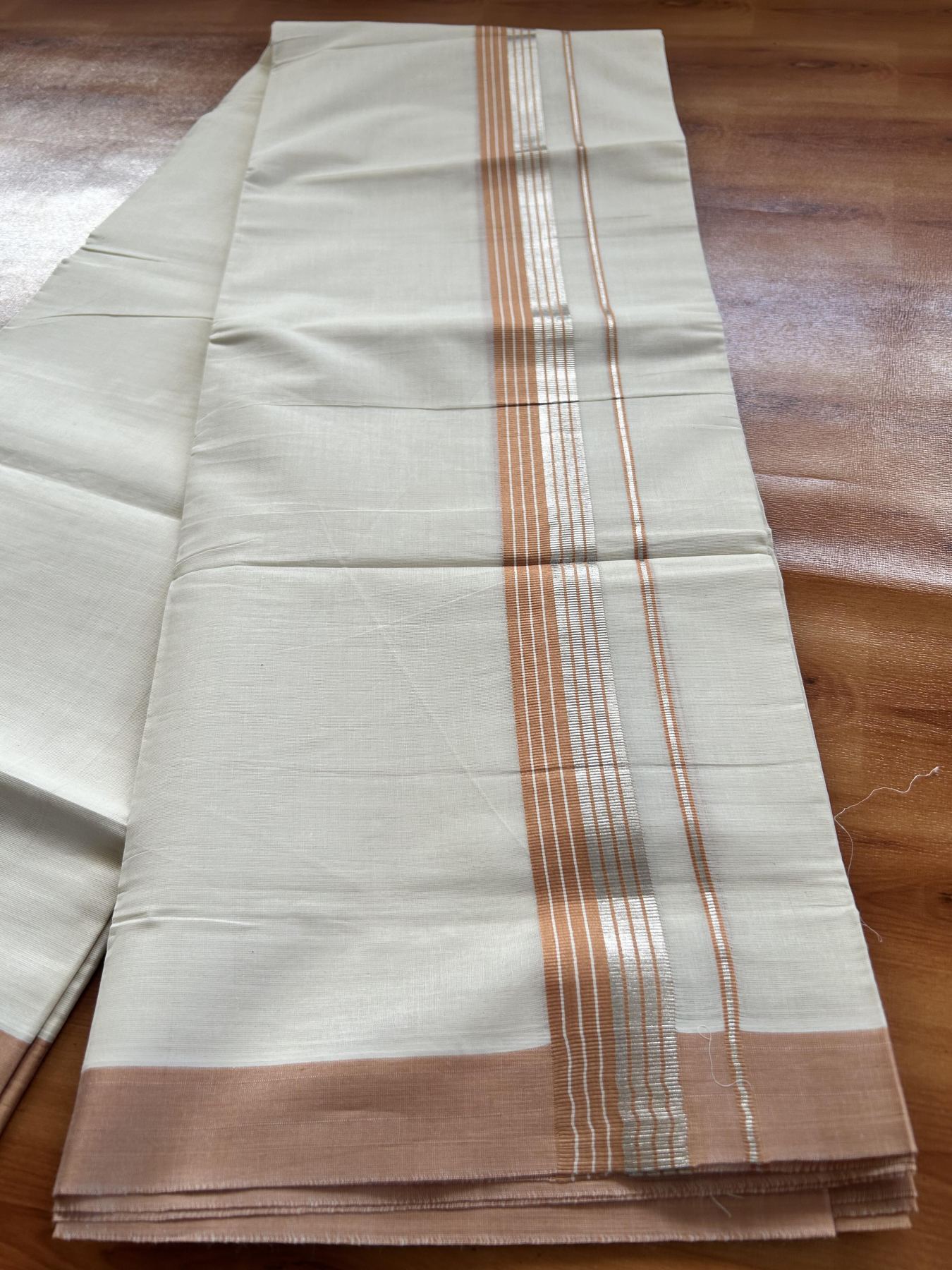 Double Off White  Mundu/Dhoti- 20% Discount! KaithariKada Balaramapuram Pure Cotton - 80s - 1.5 inch Silver Kasav & Peach Orange Striped Kara - 4mtr (8.5muzham) - 18 KK5417 VAS