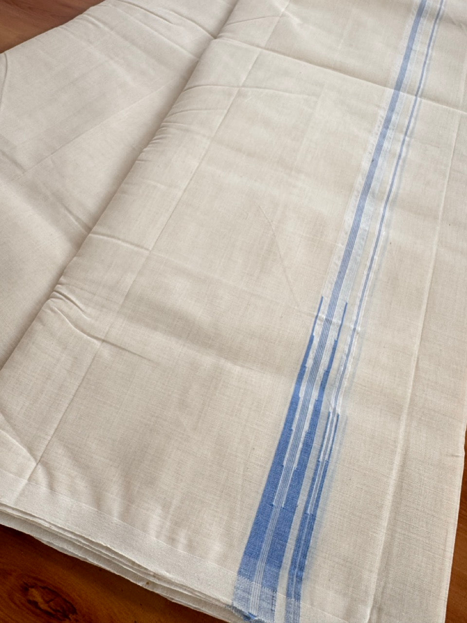 Double Off White (Unbleached) Mundu/Dhoti - 25% Discount!! KaithariKada Handloom Millpaav - 100% Pure Cotton - 80x90 - 0.75 inch Puliyilakkara Light Blue Stripes Double Chutty 4 meter (8.5 muzham) - 2 KK5507 RAM