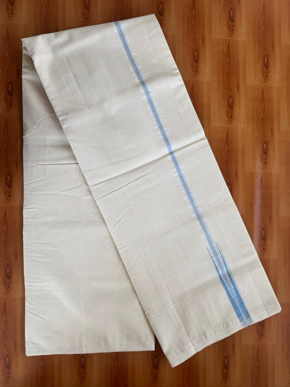 Double Off White (Unbleached) Mundu/Dhoti - 25% Discount!! KaithariKada Handloom Millpaav - 100% Pure Cotton - 80x90 - 0.75 inch Puliyilakkara Light Blue Stripes Chutty 4 meter (8.5 muzham) - 3 KK5507 RAM