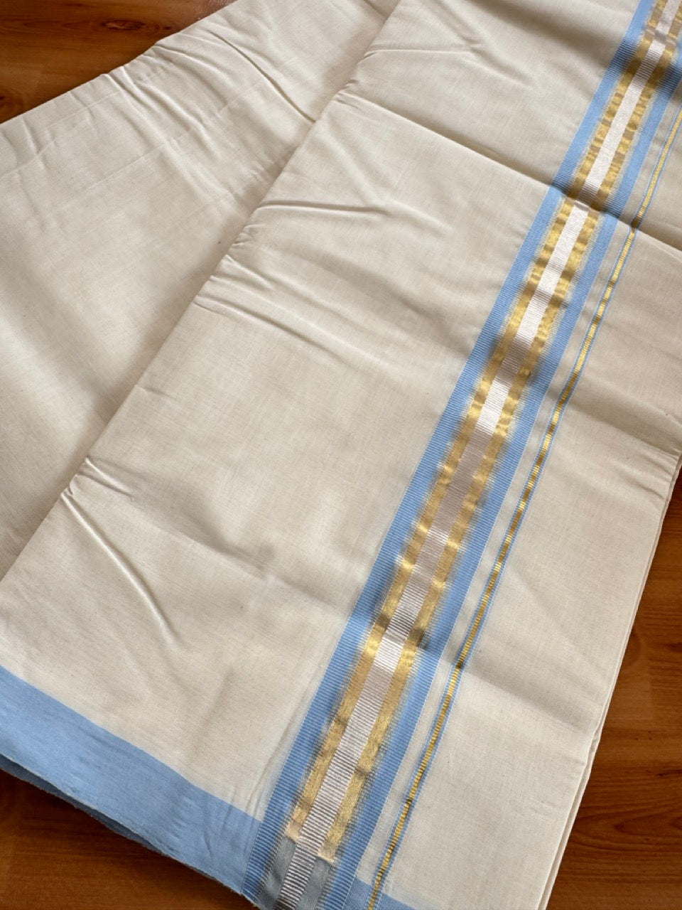 Double Off White (Unbleached) Mundu/Dhoti  25% Discount!! KaithariKada Handloom Millpaav - Kerala Handloom - 100% Pure Cotton - 80x90 - 1.75 Inch Gold Silver Kasav & Light Blue Striped Kara 4 mtr (8.5 Muzham) - 12 KK5508 RAM