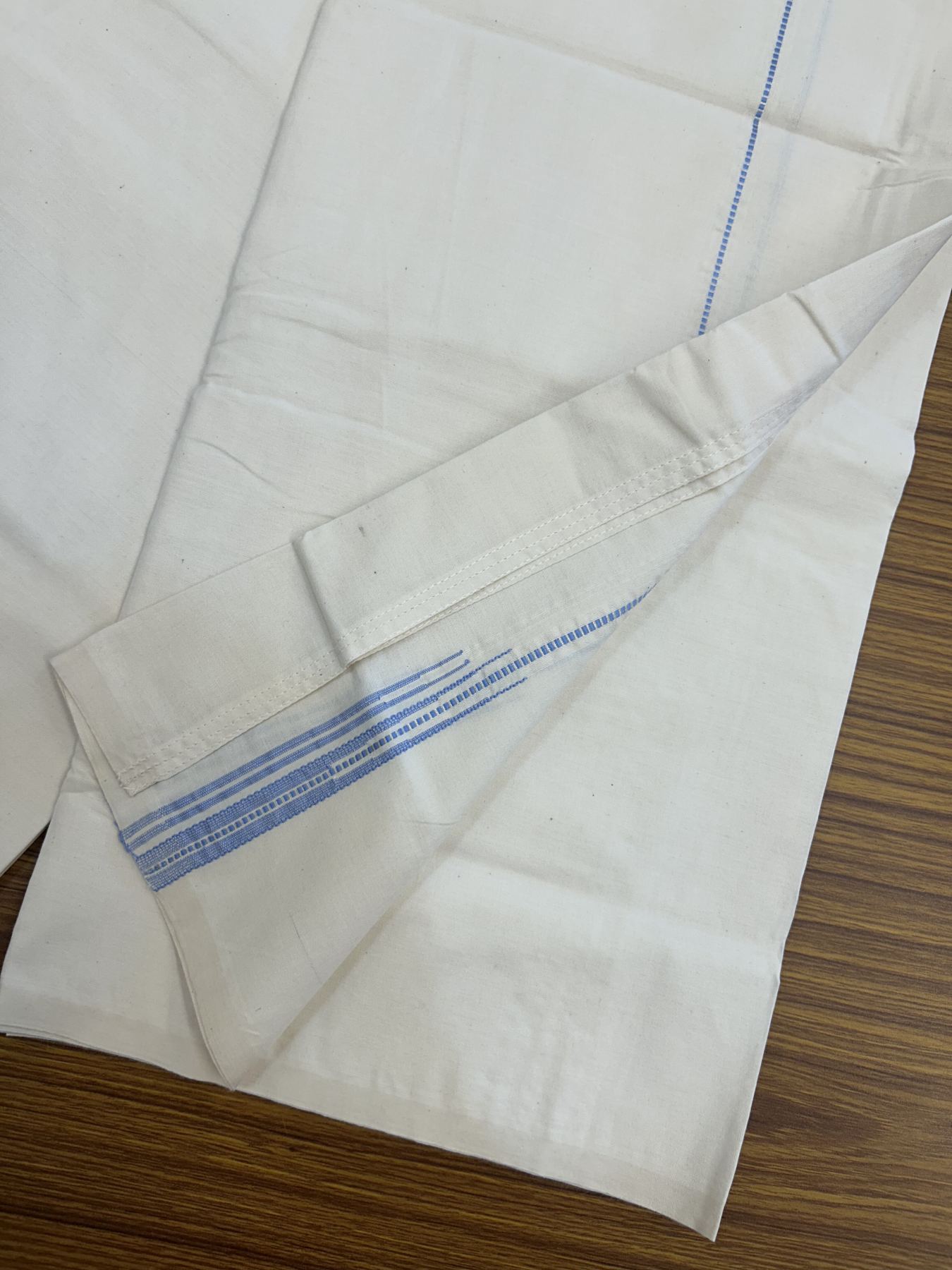 20% Discount ! KaithariKada Balaramapuram 100% Cotton Single Off White (Unbleached) Mundu/Dhoti- Twisted 100s Thread- 1 cm Puliyilakkara Silver Kasav & Light Blue Double Chutty Kara  (2 meter / 4 muzham)- 3 KK5324 ASH - Border Stitched