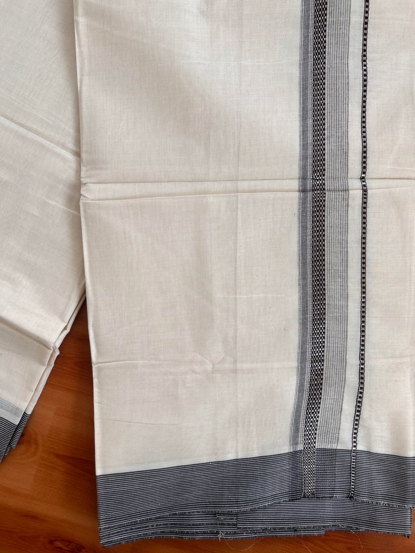 Double Off White  Mundu/Dhoti- 20% Discount! KaithariKada Balaramapuram Pure Cotton - 100x100 - 1.25 inch Silver Kasav & Black Design Striped Kara - 4mtr (8.5muzham) - 9 KK5428 VAS
